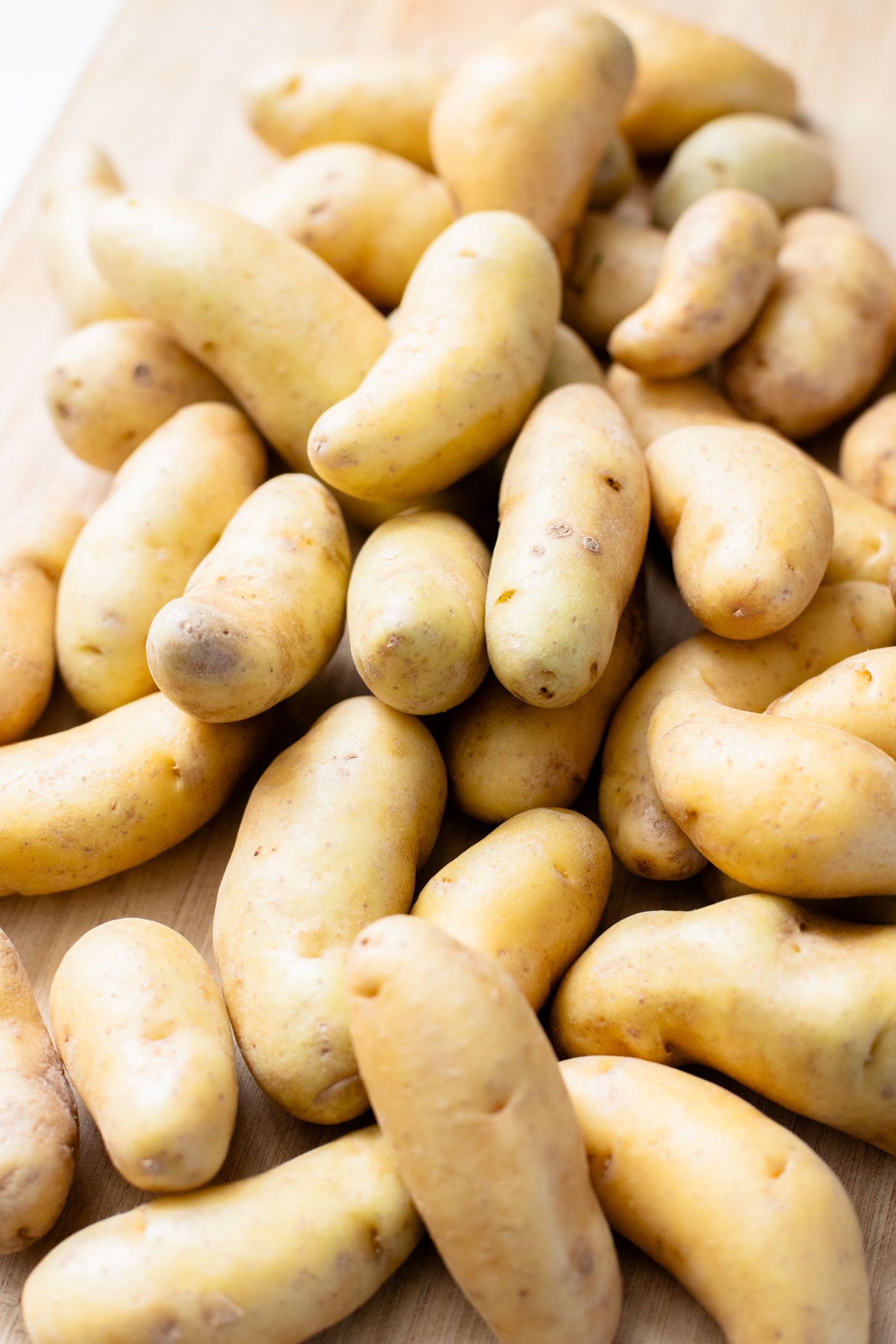 This Vegan Honey Mustard Potato Salad is the perfect spring side dish! Made with fingerling potatoes and a tangy mustard dressing | ThisSavoryVegan.com