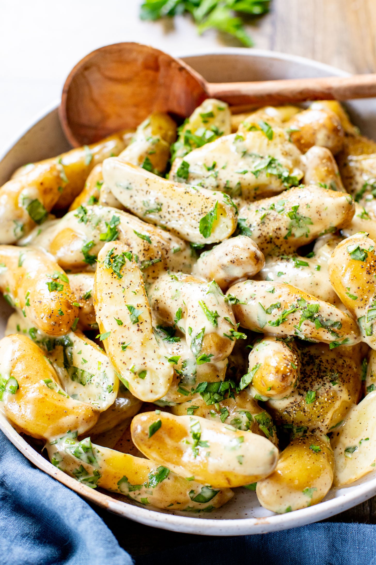 This Vegan Honey Mustard Potato Salad is the perfect spring side dish! Made with fingerling potatoes and a tangy mustard dressing | ThisSavoryVegan.com