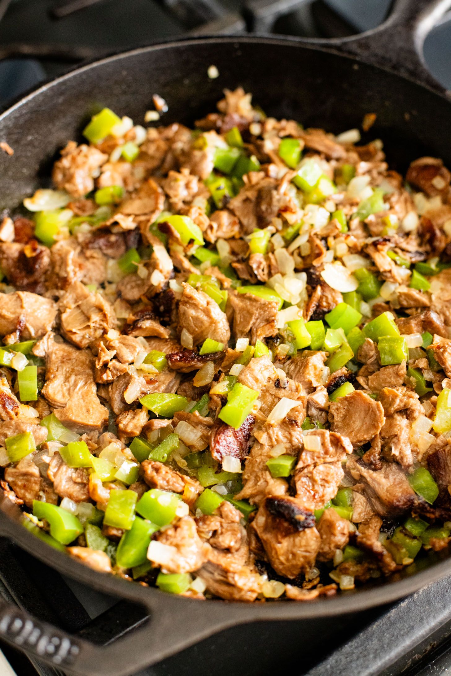 This Vegan Steak Enchilada Skillet is a quick weeknight dinner that everyone will love. Smoky, cheesy and packed with protein | ThisSavoryVegan.com