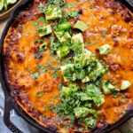 This Vegan Steak Enchilada Skillet is a quick weeknight dinner that everyone will love. Smoky, cheesy and packed with protein | ThisSavoryVegan.com