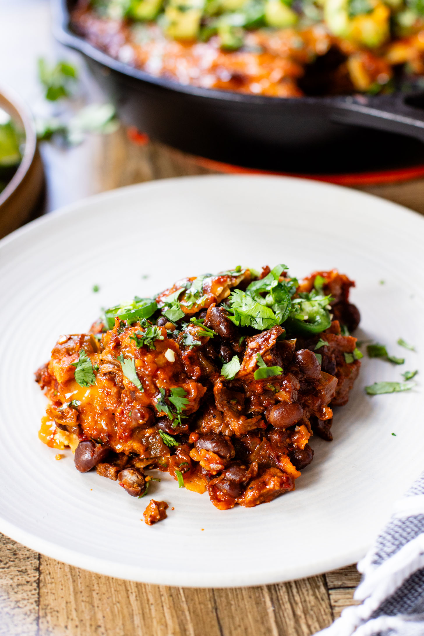 This Vegan Steak Enchilada Skillet is a quick weeknight dinner that everyone will love. Smoky, cheesy and packed with protein | ThisSavoryVegan.com