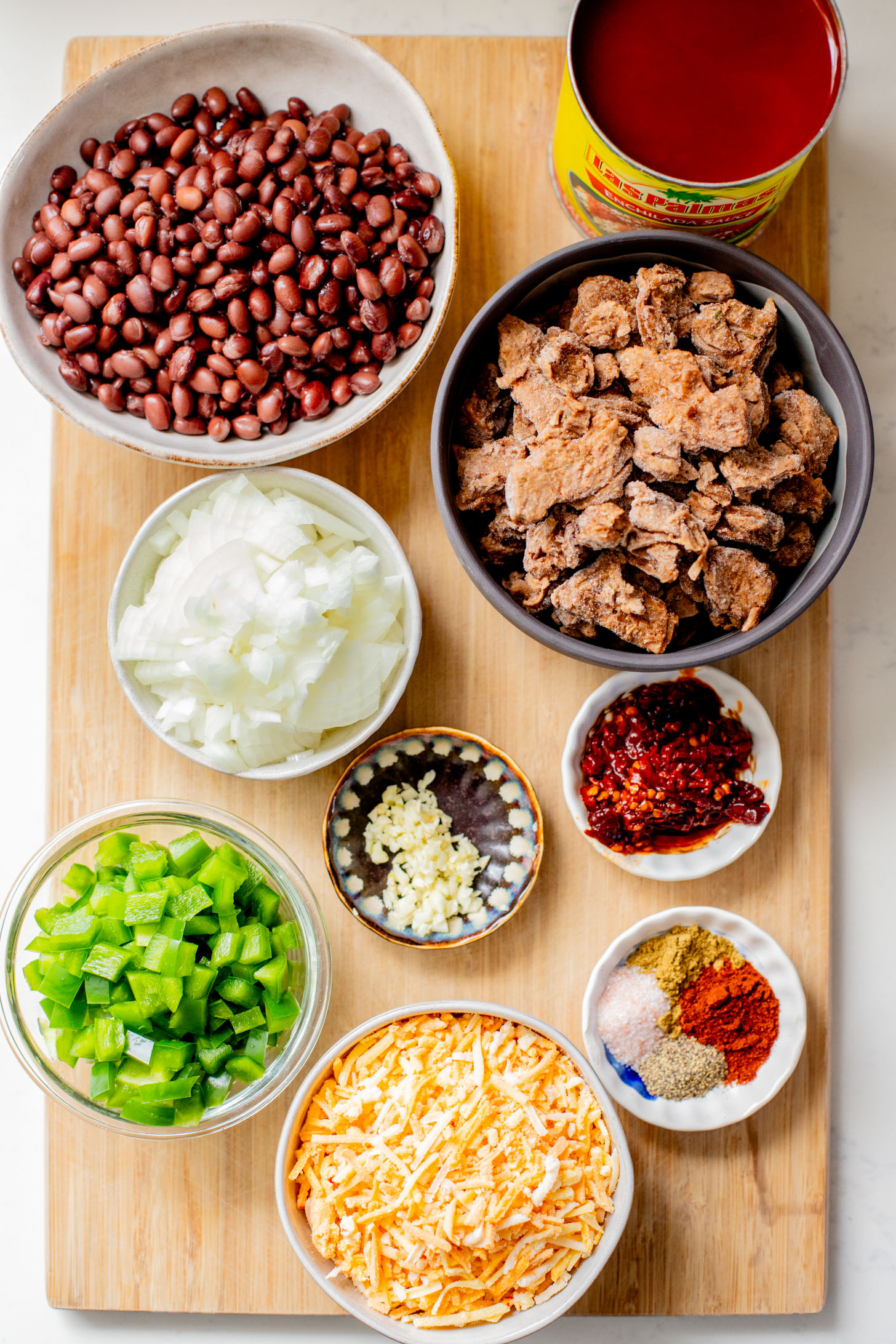 This Vegan Steak Enchilada Skillet is a quick weeknight dinner that everyone will love. Smoky, cheesy and packed with protein | ThisSavoryVegan.com