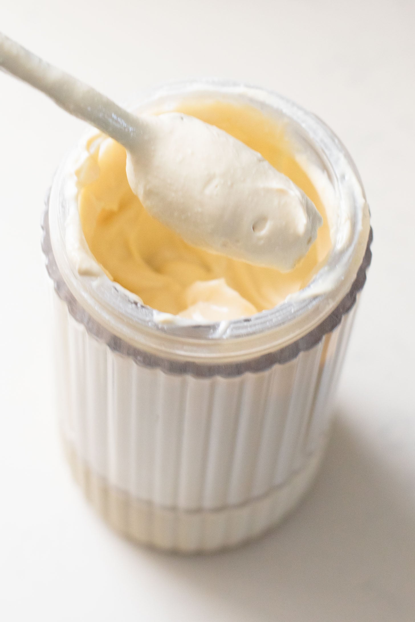 This Creamy Spinach Tofu Shells recipe is a comforting vegan pasta that sneaks in protein & veggies. Made in one pot for easy clean up | ThisSavoryVegan.com