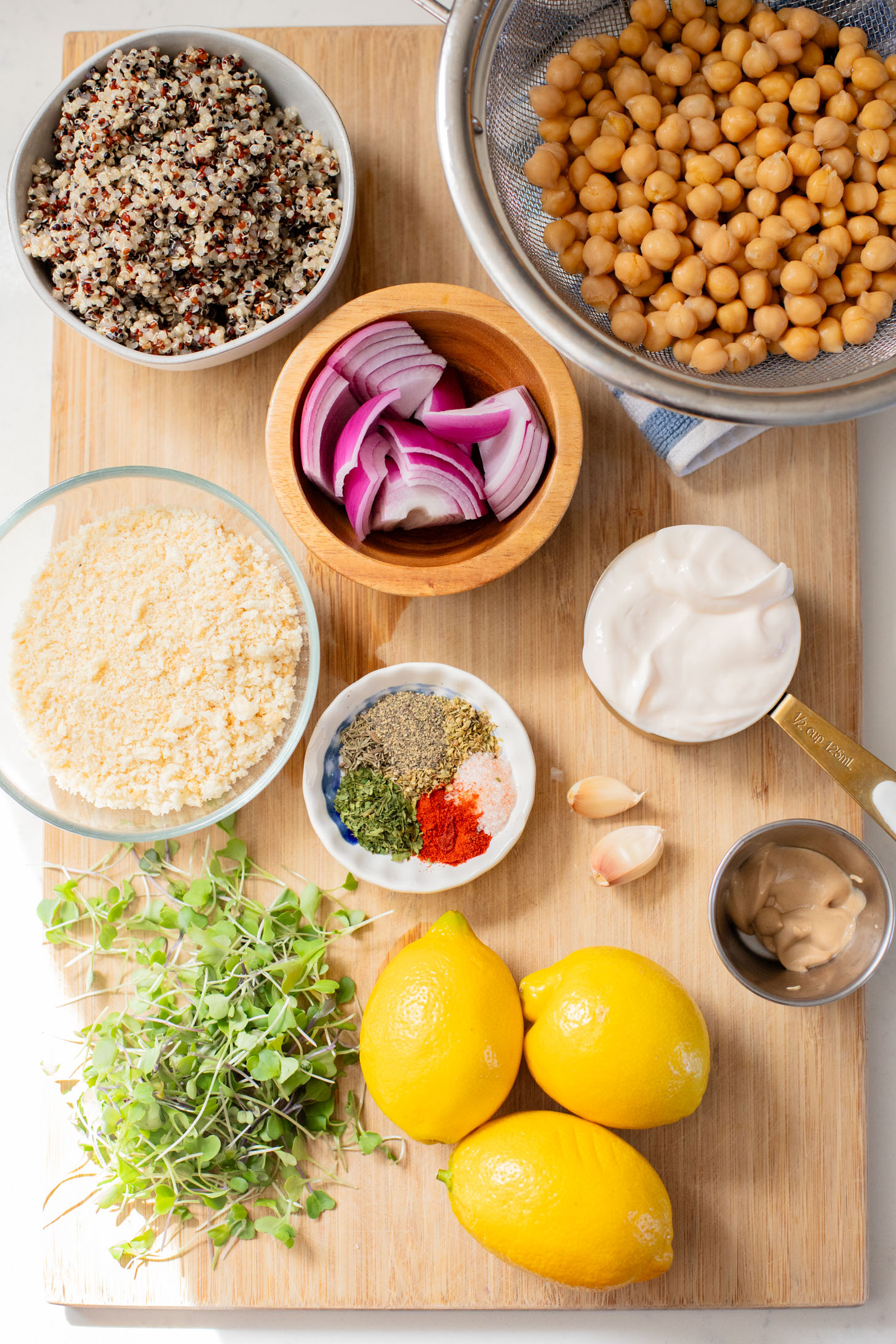 These Crispy Chickpea Quinoa Patties are made with simple ingredients and topped with a dairy-free lemon garlic aioli | ThisSavoryVegan.com