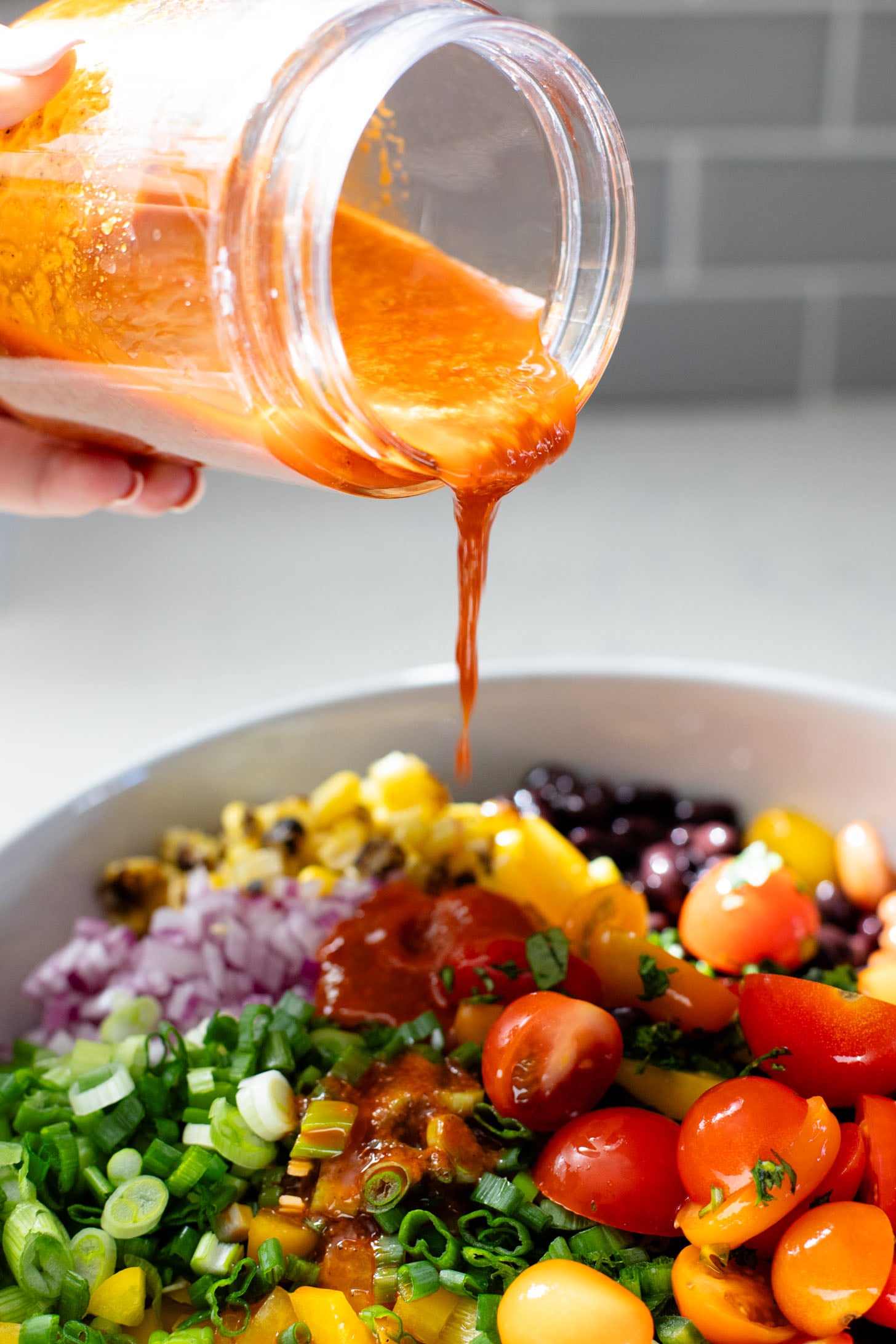 This Dense Bean Taco Salad is the perfect meal prep idea. Three types of beans, lots of veggies and a smoky chipotle dressing | ThisSavoryVegan.com