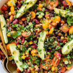 This Dense Bean Taco Salad is the perfect meal prep idea. Three types of beans, lots of veggies and a smoky chipotle dressing | ThisSavoryVegan.com