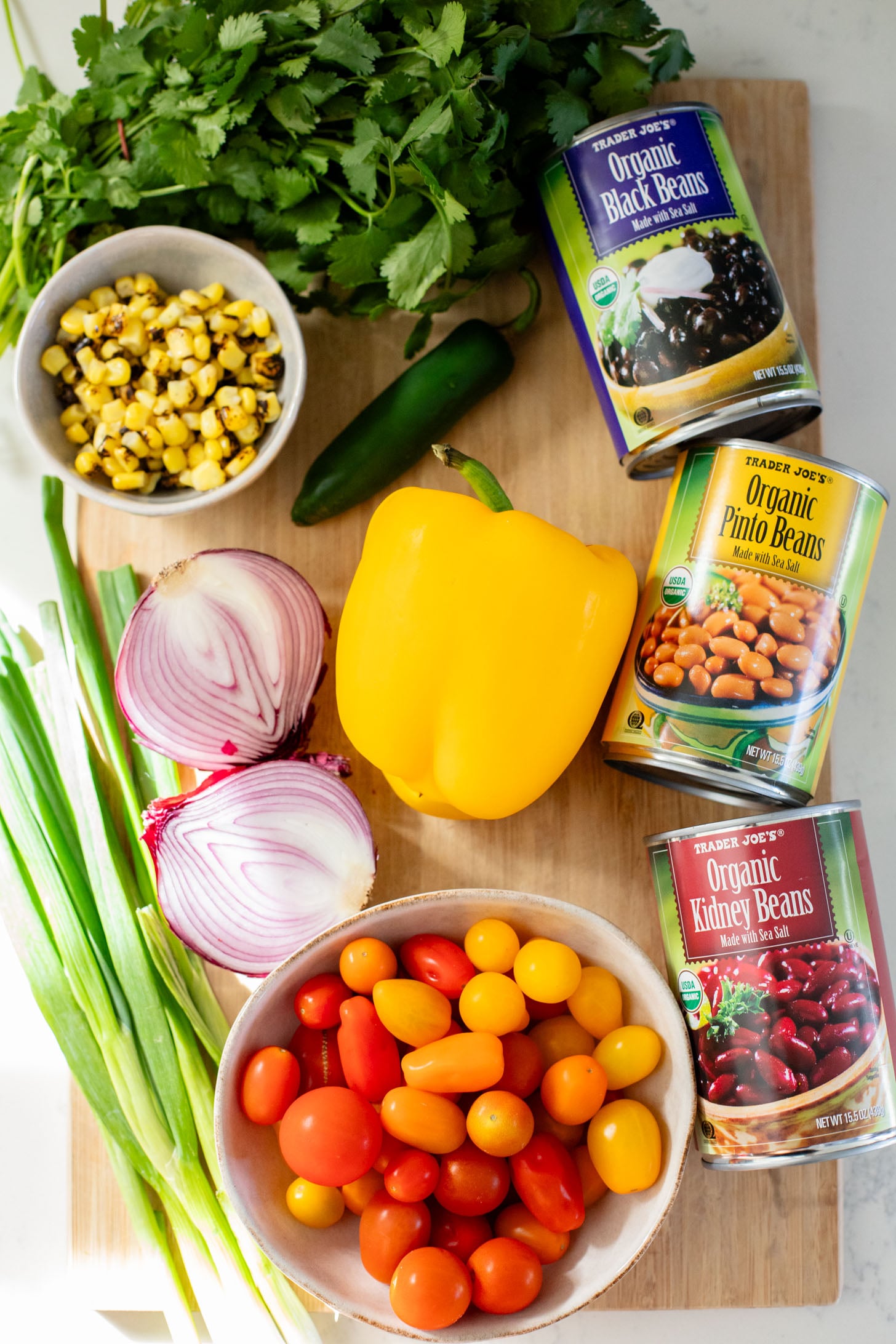 This Dense Bean Taco Salad is the perfect meal prep idea. Three types of beans, lots of veggies and a smoky chipotle dressing | ThisSavoryVegan.com