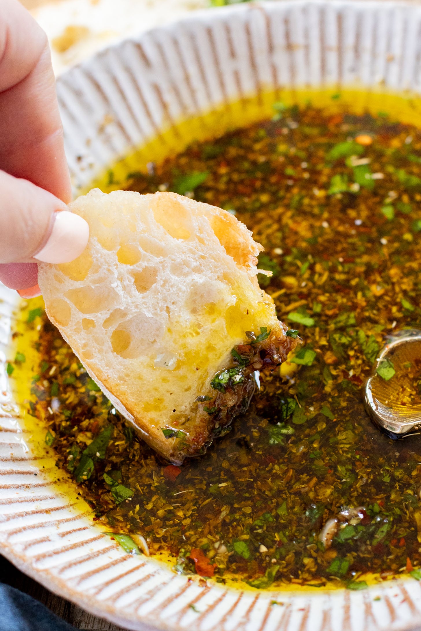 There is nothing better than enjoying some Bread Dipping Oil with some warm bread. Ready in 5 minutes and super delicious | ThisSavoryVegan.com