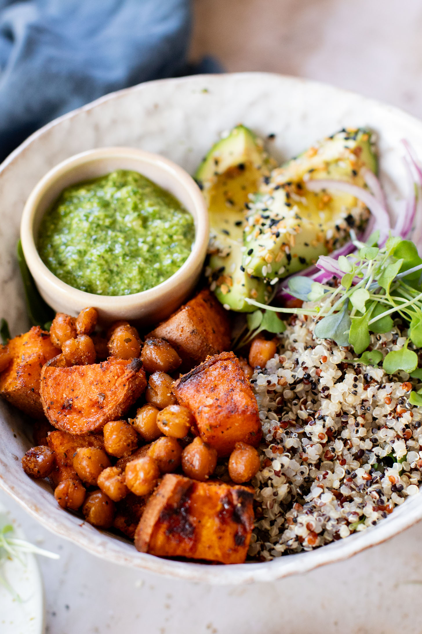 These Pesto Sweet Potato Quinoa Bowls are a super delicious vegan lunch or dinner. Packed with nutritious ingredients & plant protein | ThisSavoryVegan.com
