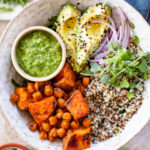 These Pesto Sweet Potato Quinoa Bowls are a super delicious vegan lunch or dinner. Packed with nutritious ingredients & plant protein | ThisSavoryVegan.com