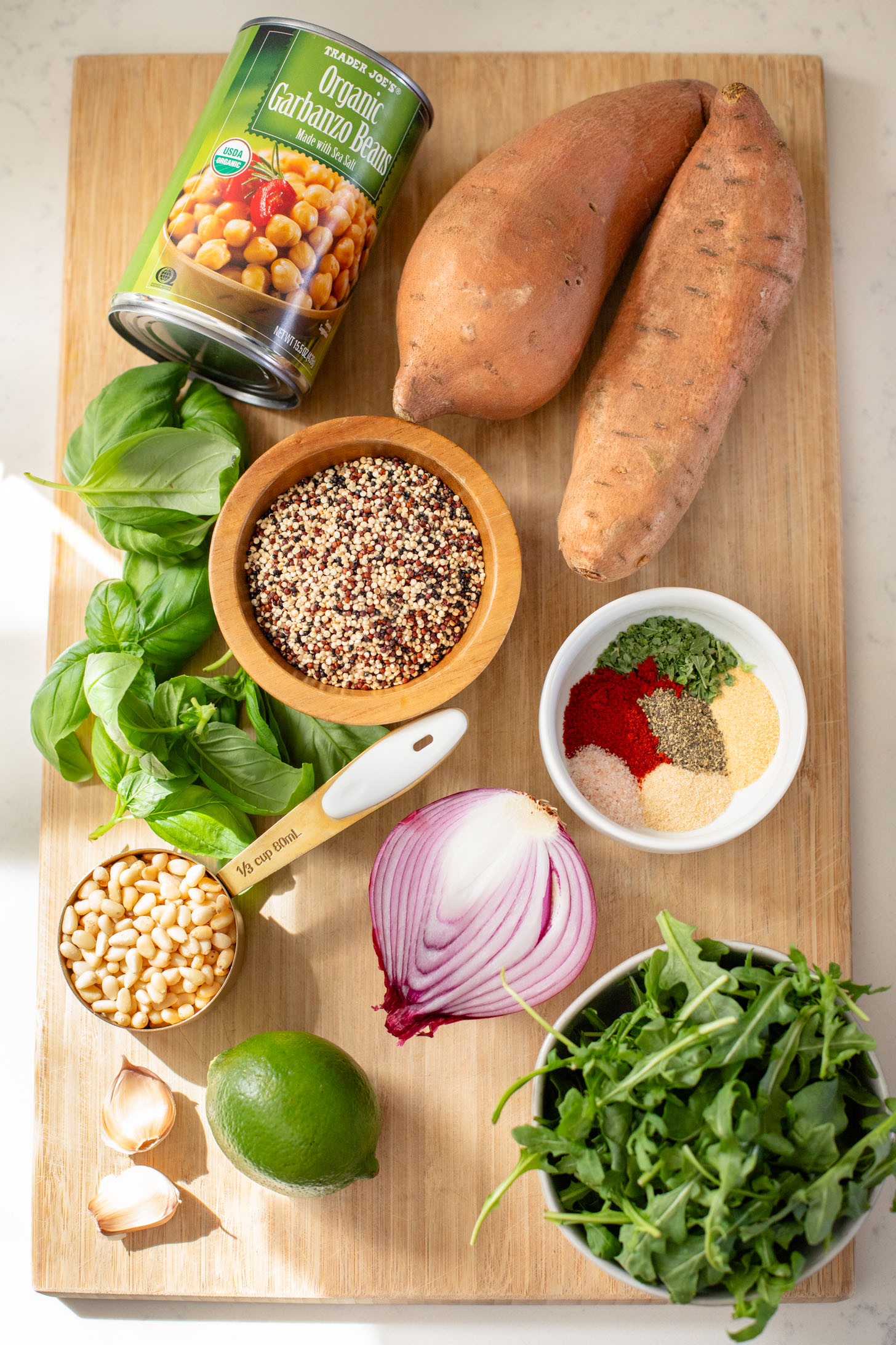 These Pesto Sweet Potato Quinoa Bowls are a super delicious vegan lunch or dinner. Packed with nutritious ingredients & plant protein | ThisSavoryVegan.com
