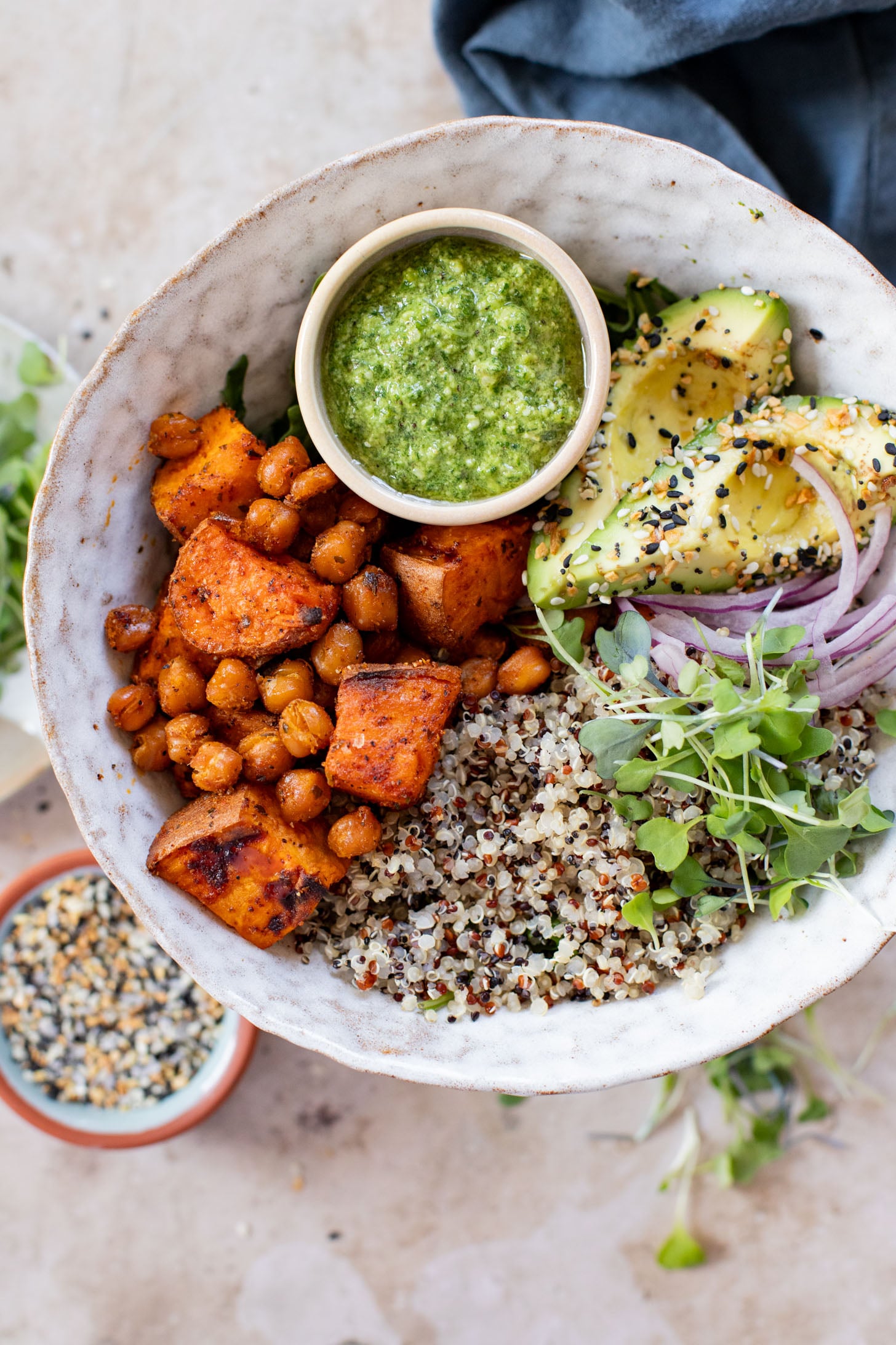 These Pesto Sweet Potato Quinoa Bowls are a super delicious vegan lunch or dinner. Packed with nutritious ingredients & plant protein | ThisSavoryVegan.com