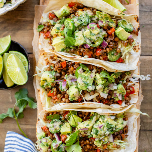 These Spicy Lentil Tacos bring the heat...and pack in some healthy, plant protein. Ready in under 30 minutes, these are perfect weeknight tacos | ThisSavoryVegan.com