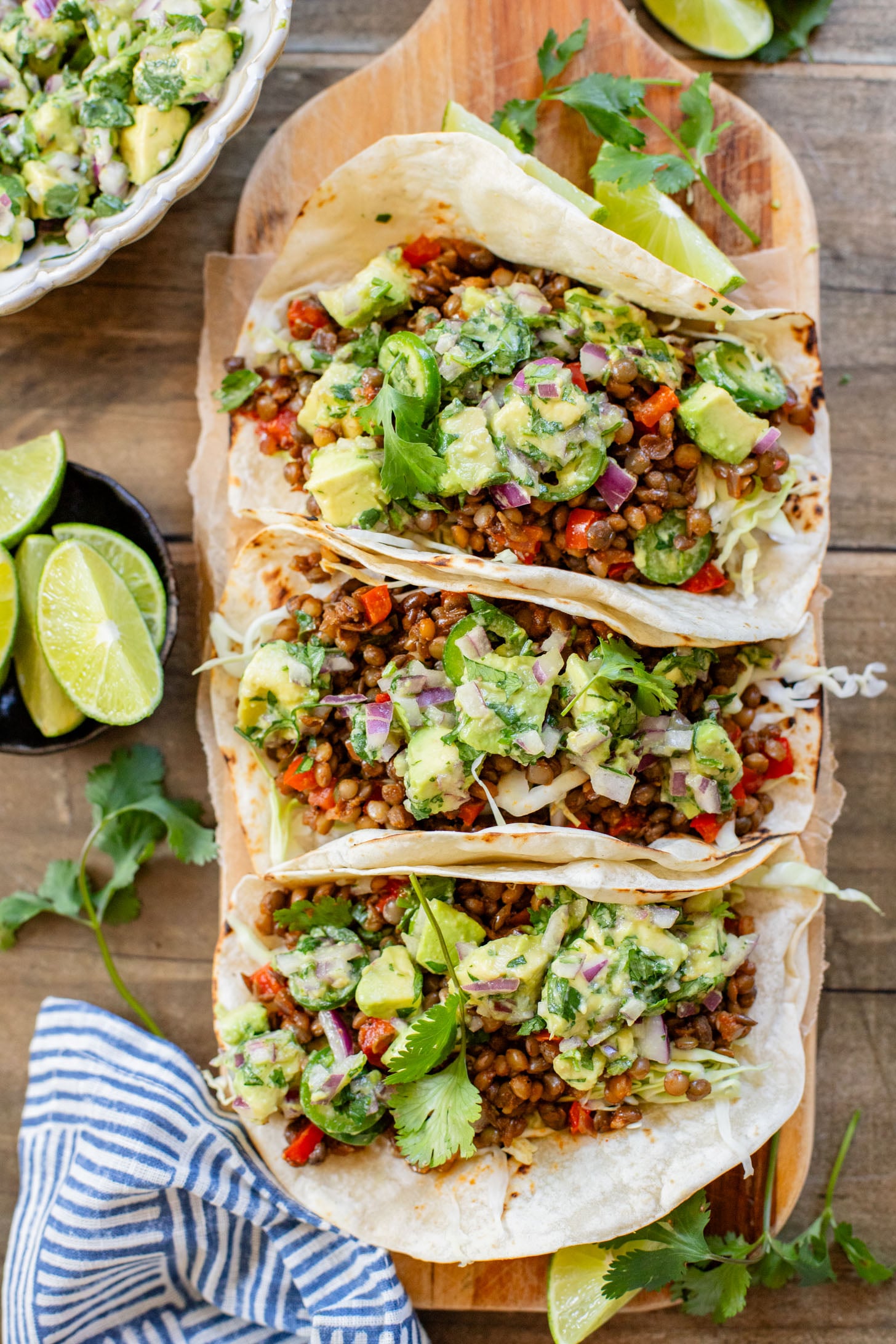 These Spicy Lentil Tacos bring the heat...and pack in some healthy, plant protein. Ready in under 30 minutes, these are perfect weeknight tacos | ThisSavoryVegan.com