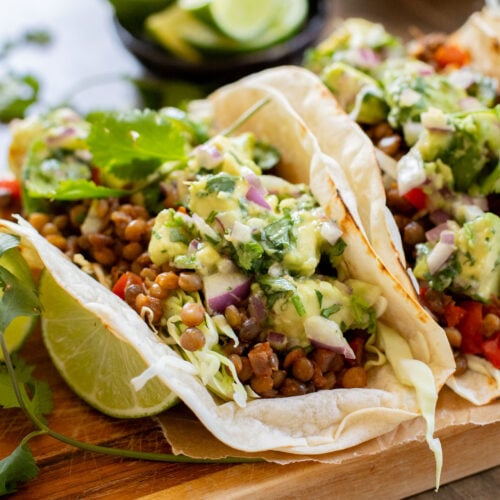 These Spicy Lentil Tacos bring the heat...and pack in some healthy, plant protein. Ready in under 30 minutes, these are perfect weeknight tacos | ThisSavoryVegan.com