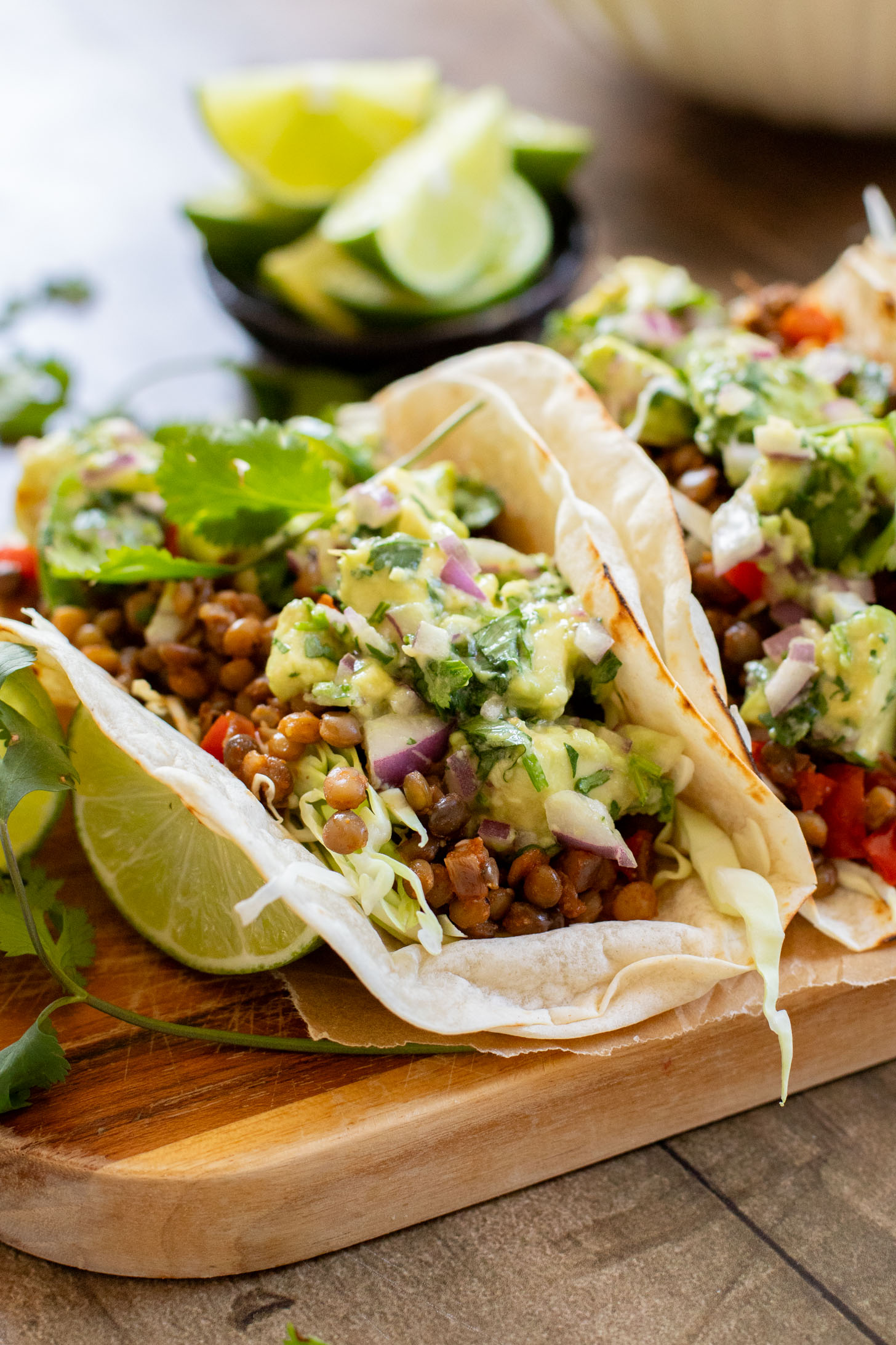 These Spicy Lentil Tacos bring the heat...and pack in some healthy, plant protein. Ready in under 30 minutes, these are perfect weeknight tacos | ThisSavoryVegan.com