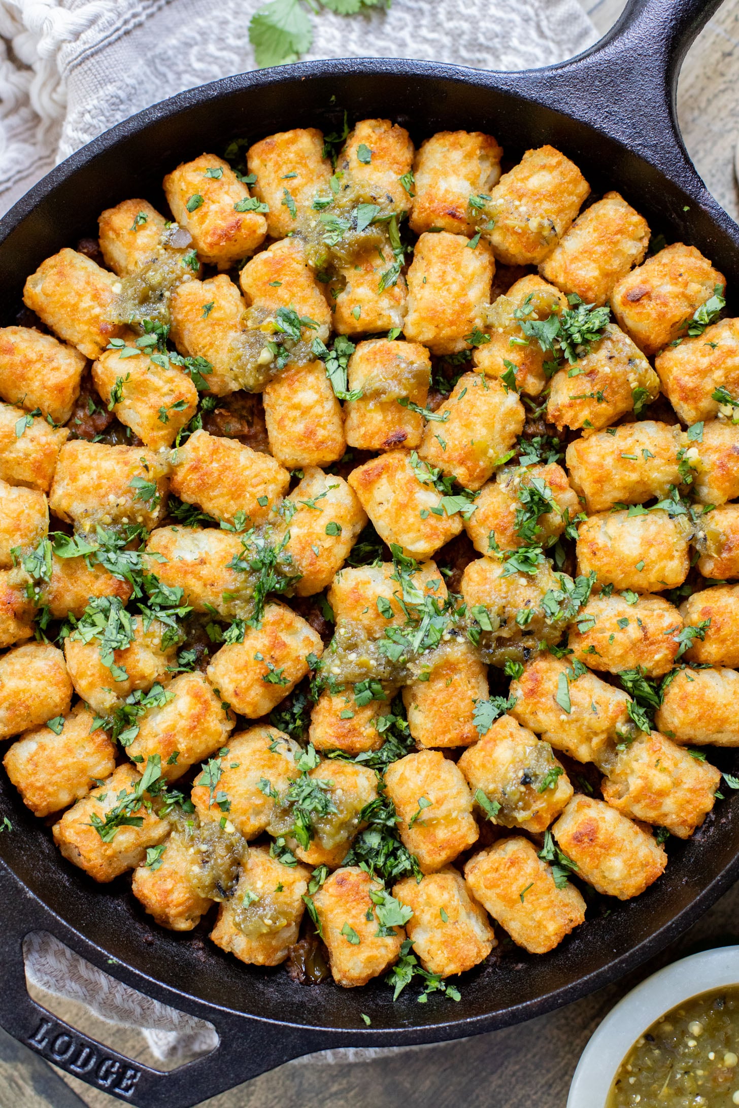 This Taco Tater Tot Casserole is a family dinner that everyone will love! It is quick, easy, meat-free and dairy-free. And, of course, super tasty | ThisSavoryVegan.com