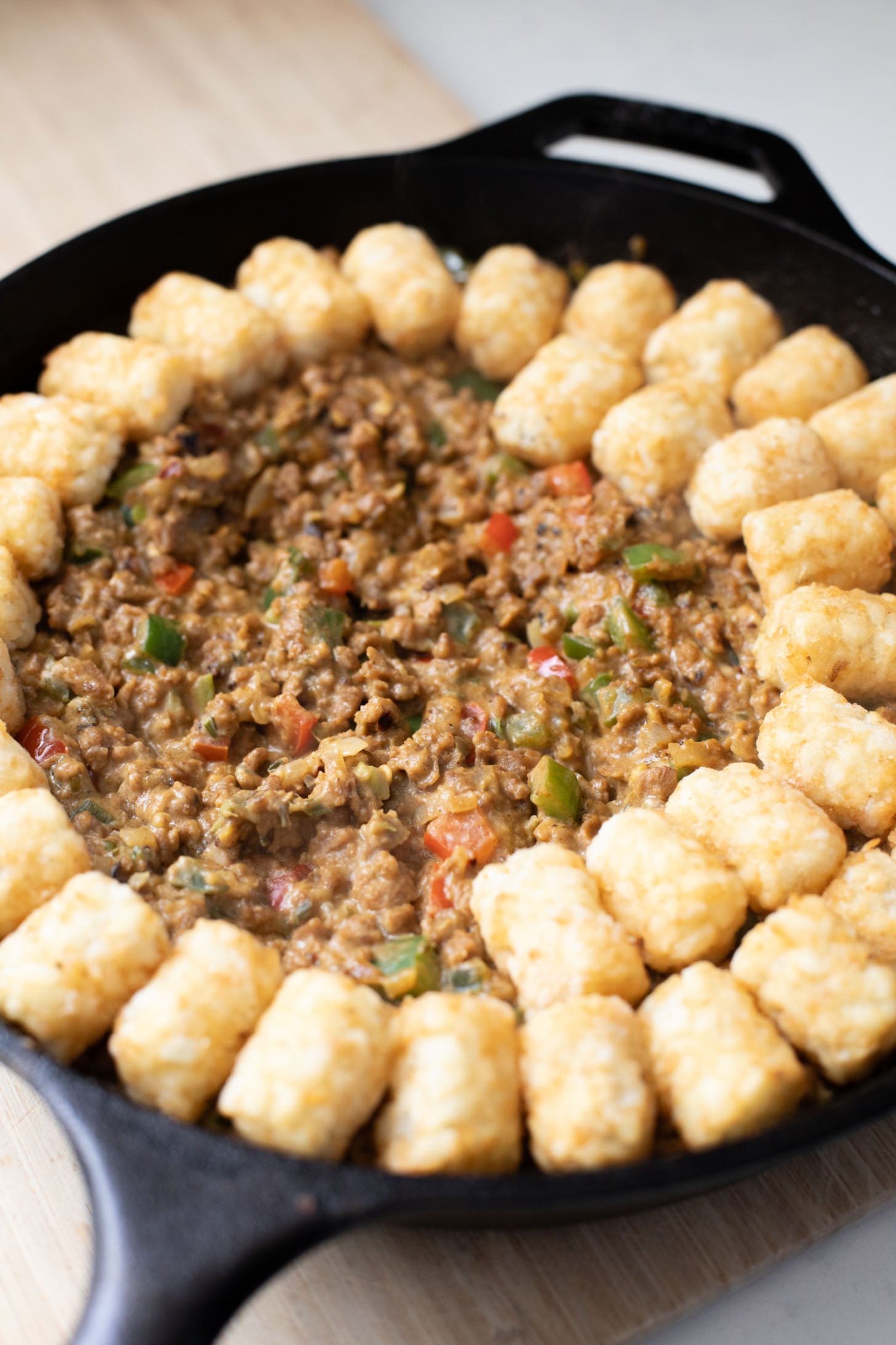 This Taco Tater Tot Casserole is a family dinner that everyone will love! It is quick, easy, meat-free and dairy-free. And, of course, super tasty | ThisSavoryVegan.com