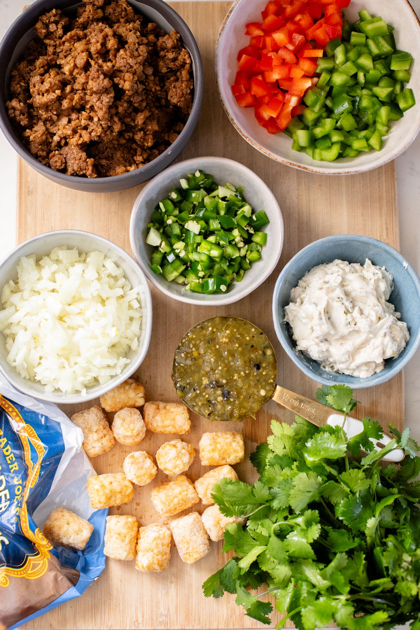 This Taco Tater Tot Casserole is a family dinner that everyone will love! It is quick, easy, meat-free and dairy-free. And, of course, super tasty | ThisSavoryVegan.com