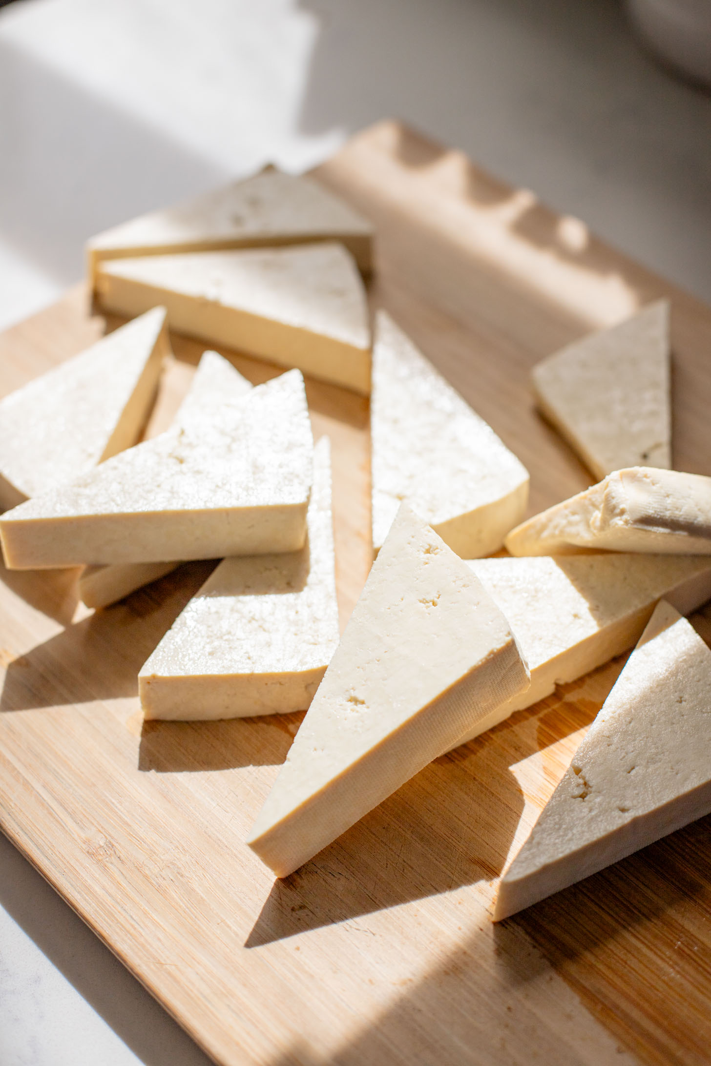 These Teriyaki Tofu Rice Bowls are a quick weeknight dinner. The tofu is sticky & crispy and is topped off with a ginger avocado salsa | ThisSavoryVegan.com