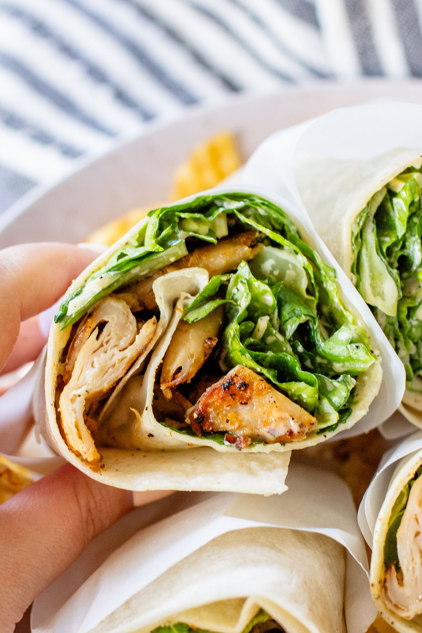 These Vegan Chicken Caesar Wraps are the best way to eat your favorite Caesar salad on-the-go! Delicious flavors and dairy-free | ThisSavoryVegan.com