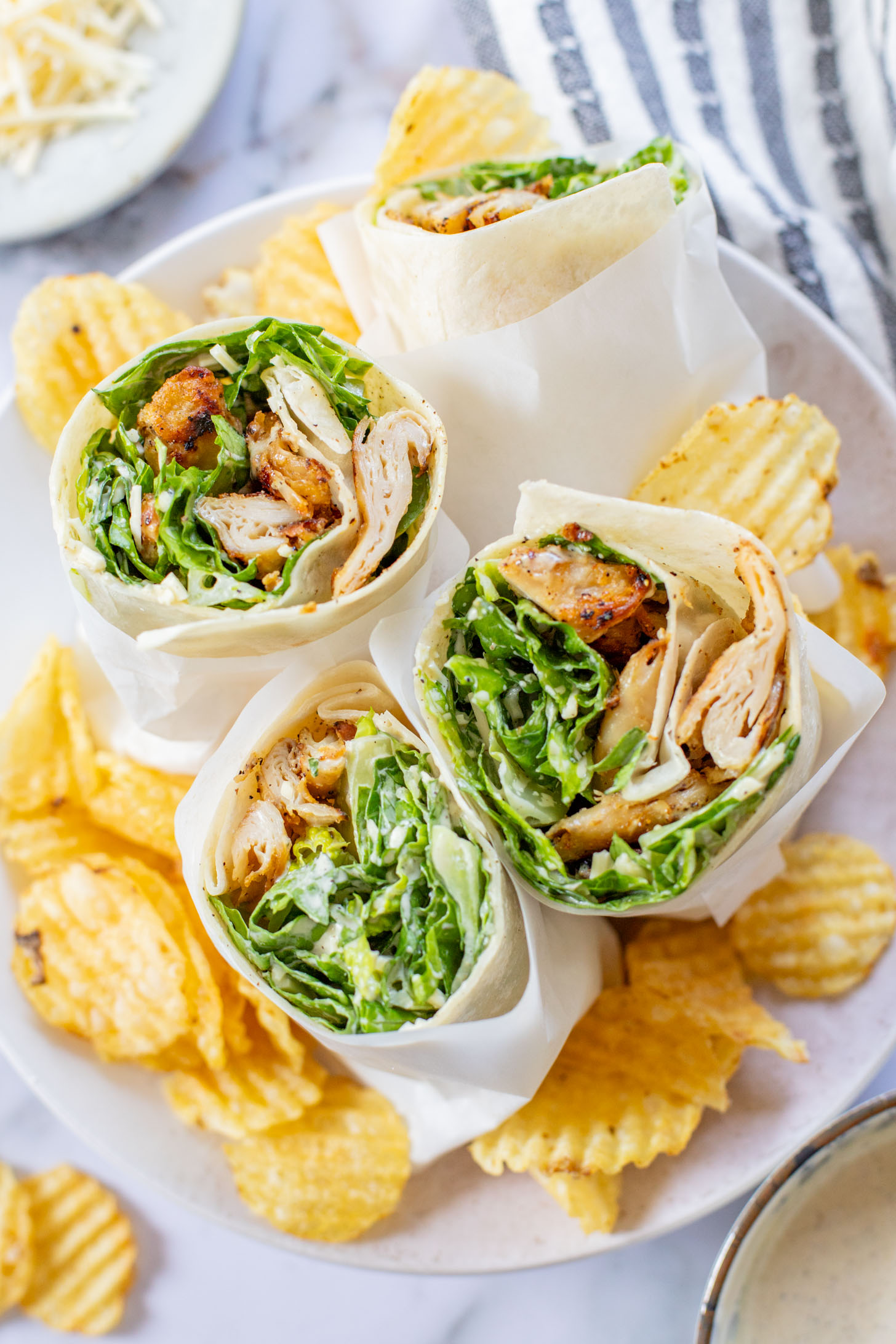 These Vegan Chicken Caesar Wraps are the best way to eat your favorite Caesar salad on-the-go! Delicious flavors and dairy-free | ThisSavoryVegan.com