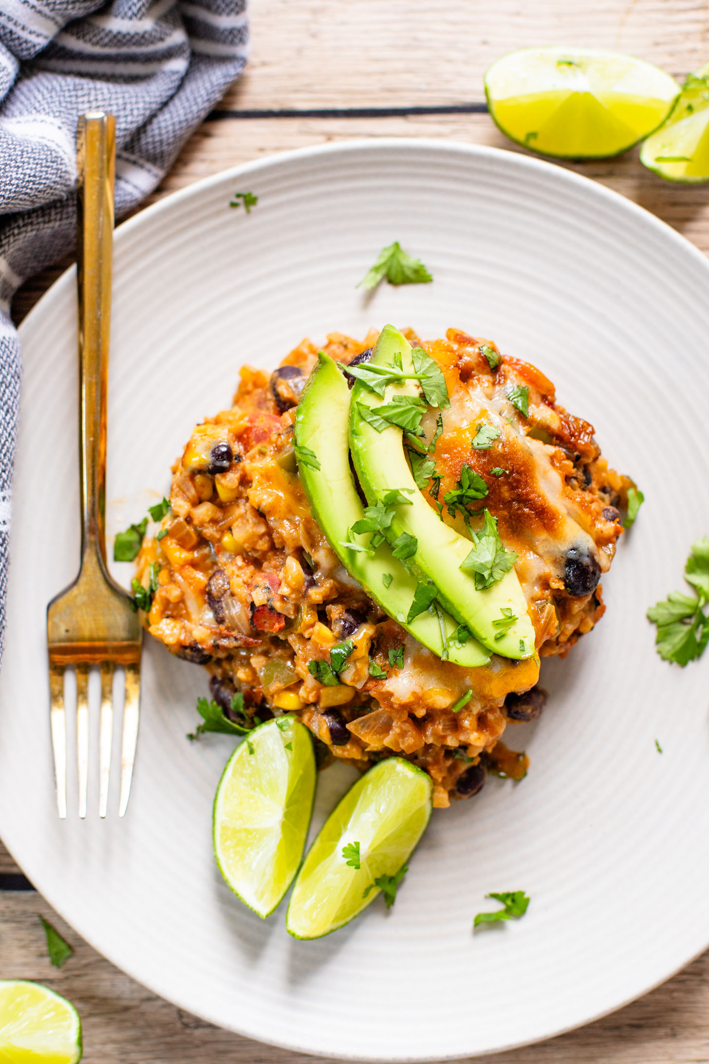 This Cauliflower Rice Taco Casserole is the perfect low-carb weeknight dinner. Packed with veggies, plant protein & also dairy-free | ThisSavoryVegan.com