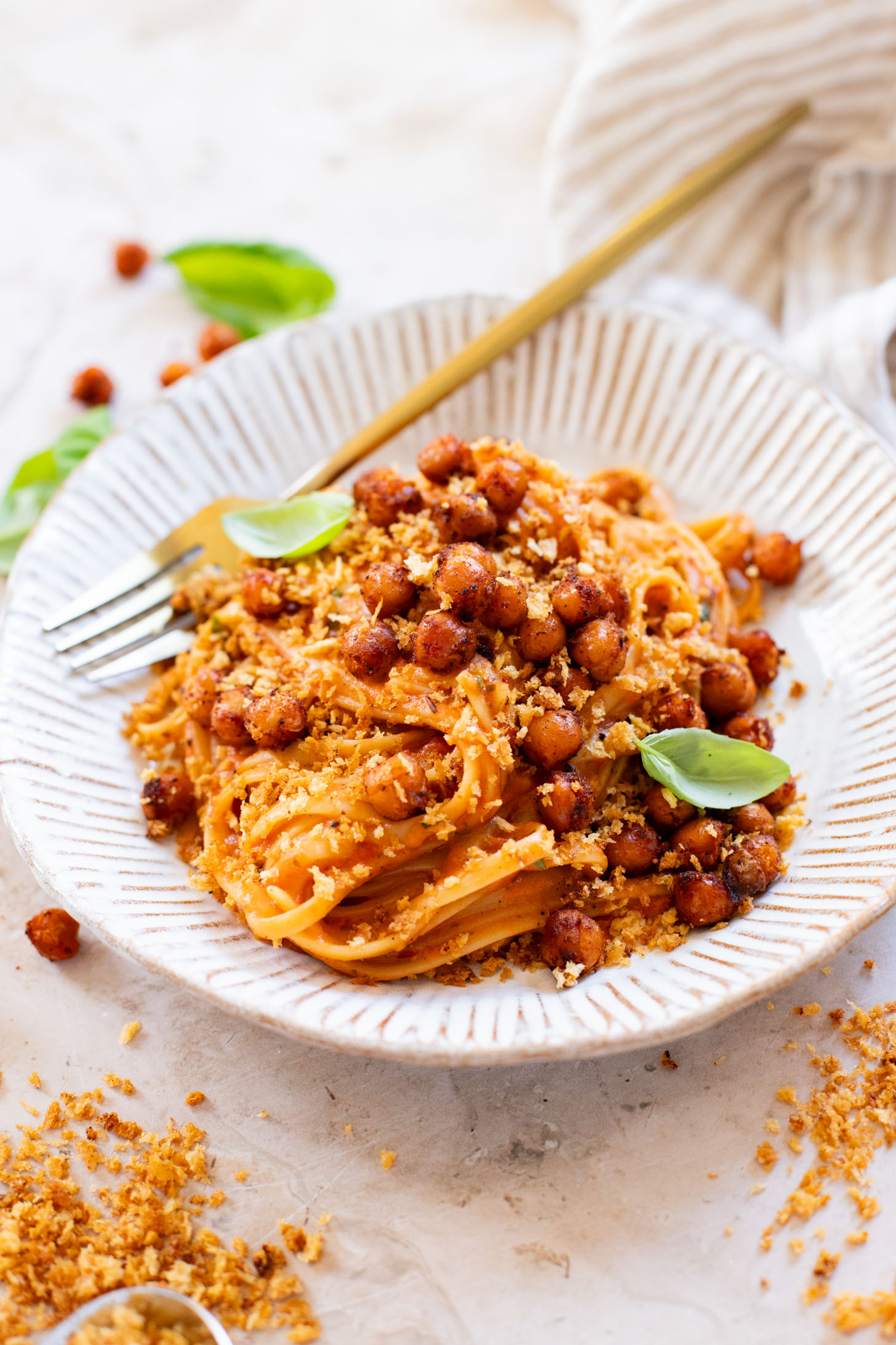 This Creamy Linguine with Crispy Chickpeas is a dairy-free pasta with a sneaky creamy ingredient. The perfect weeknight dinner | ThisSavoryVegan.com