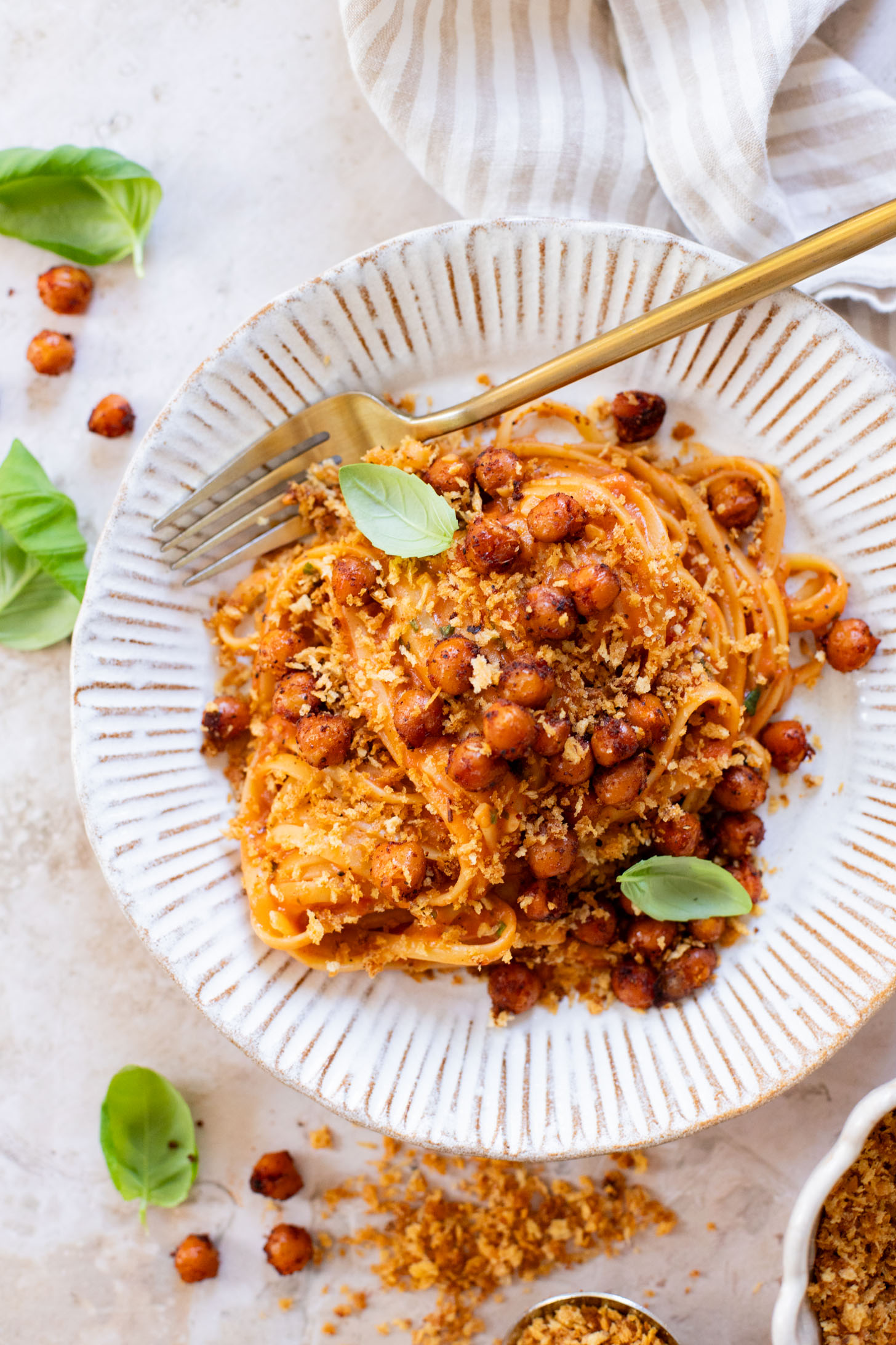 This Creamy Linguine with Crispy Chickpeas is a dairy-free pasta with a sneaky creamy ingredient. The perfect weeknight dinner | ThisSavoryVegan.com