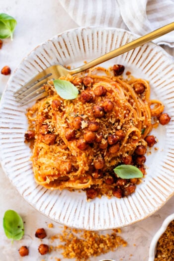 This Creamy Linguine with Crispy Chickpeas is a dairy-free pasta with a sneaky creamy ingredient. The perfect weeknight dinner | ThisSavoryVegan.com