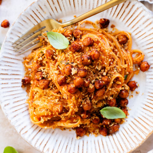 This Creamy Linguine with Crispy Chickpeas is a dairy-free pasta with a sneaky creamy ingredient. The perfect weeknight dinner | ThisSavoryVegan.com