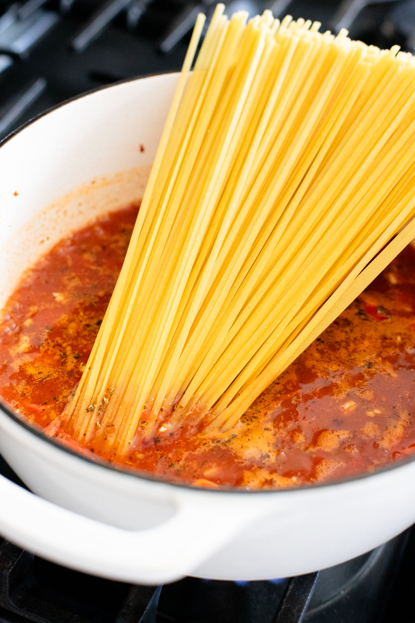 This Creamy Linguine with Crispy Chickpeas is a dairy-free pasta with a sneaky creamy ingredient. The perfect weeknight dinner | ThisSavoryVegan.com