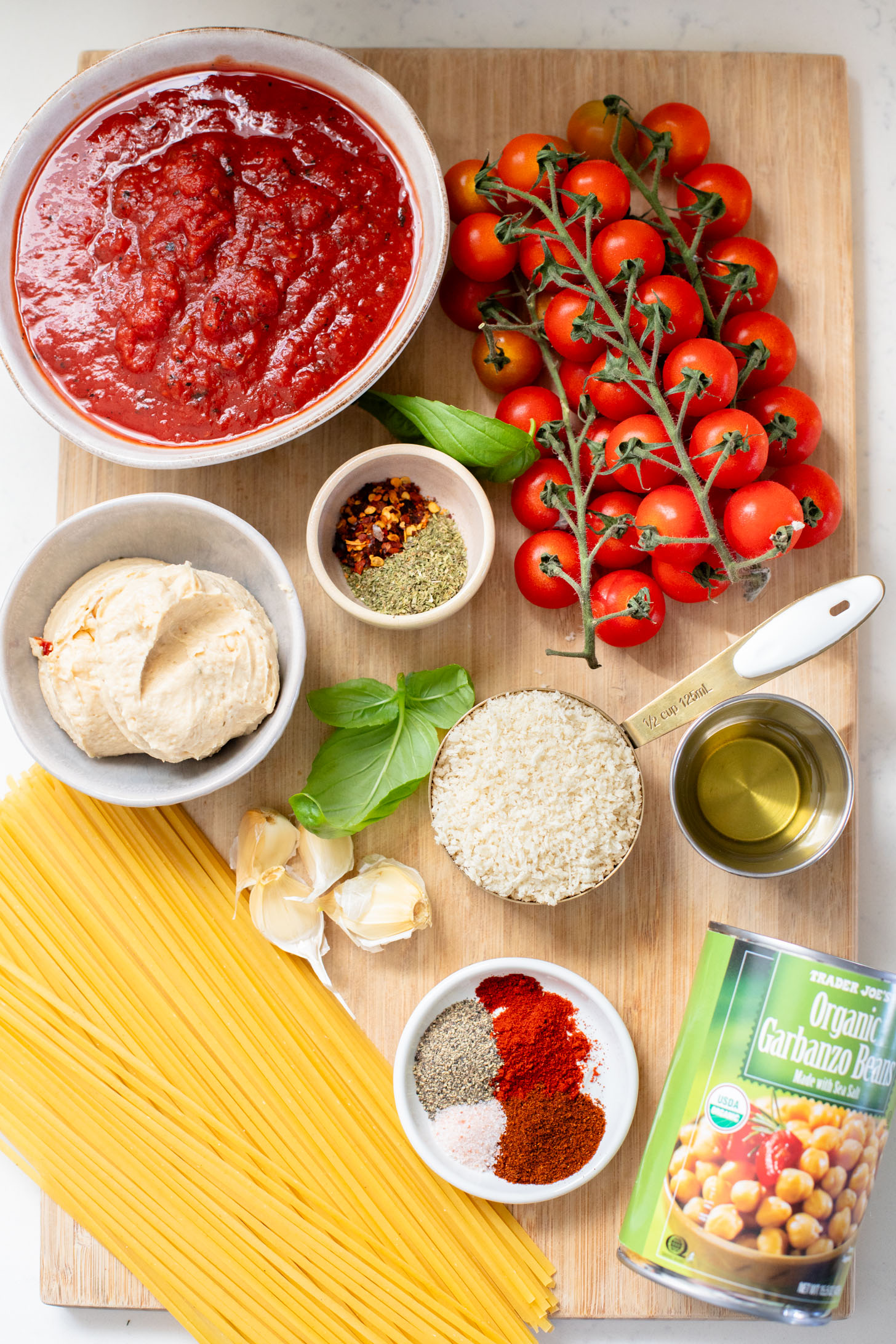 This Creamy Linguine with Crispy Chickpeas is a dairy-free pasta with a sneaky creamy ingredient. The perfect weeknight dinner | ThisSavoryVegan.com