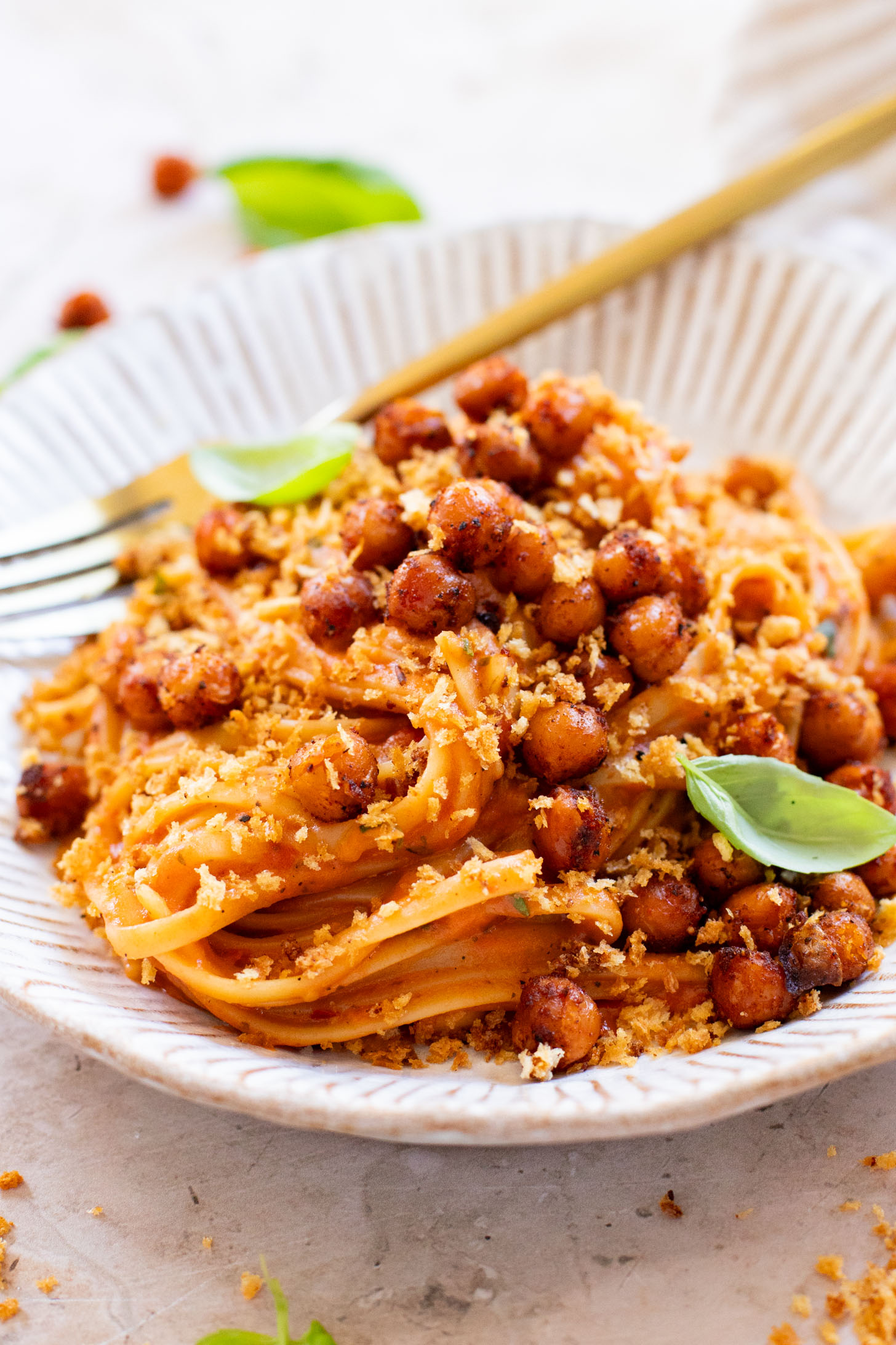 This Creamy Linguine with Crispy Chickpeas is a dairy-free pasta with a sneaky creamy ingredient. The perfect weeknight dinner | ThisSavoryVegan.com