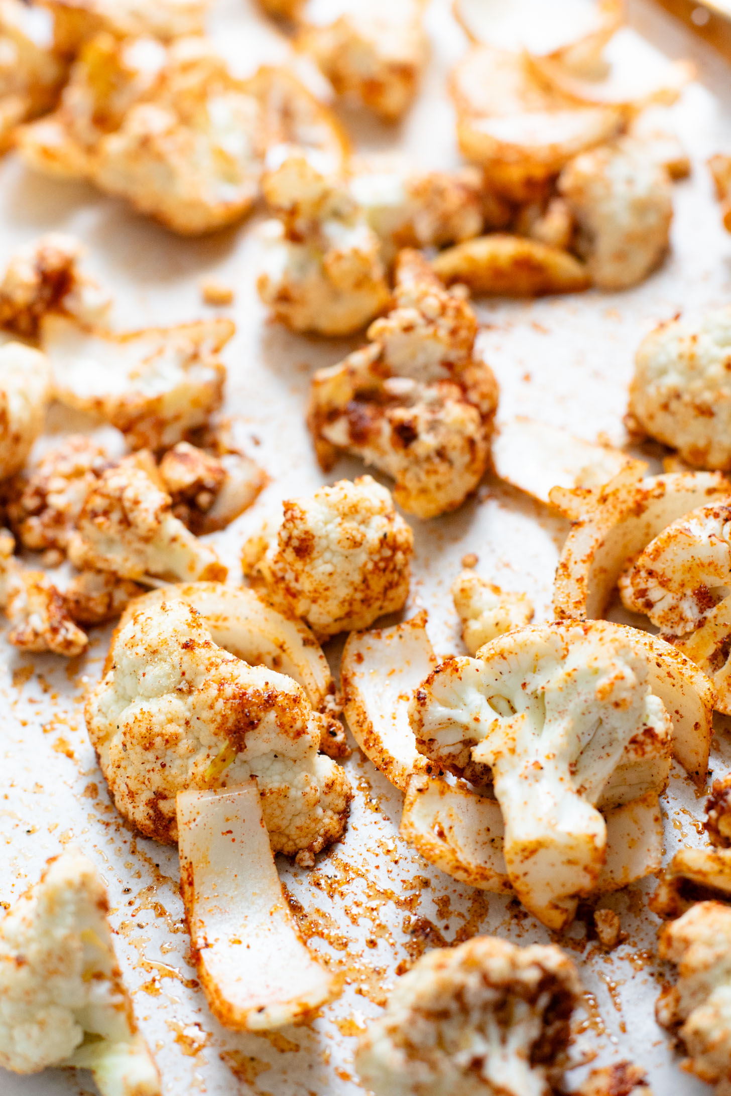 This Sheet Pan Vegan Sausage & Cauliflower is the perfect weeknight dinner. Served over rice with a pesto aioli | ThisSavoryVegan.com