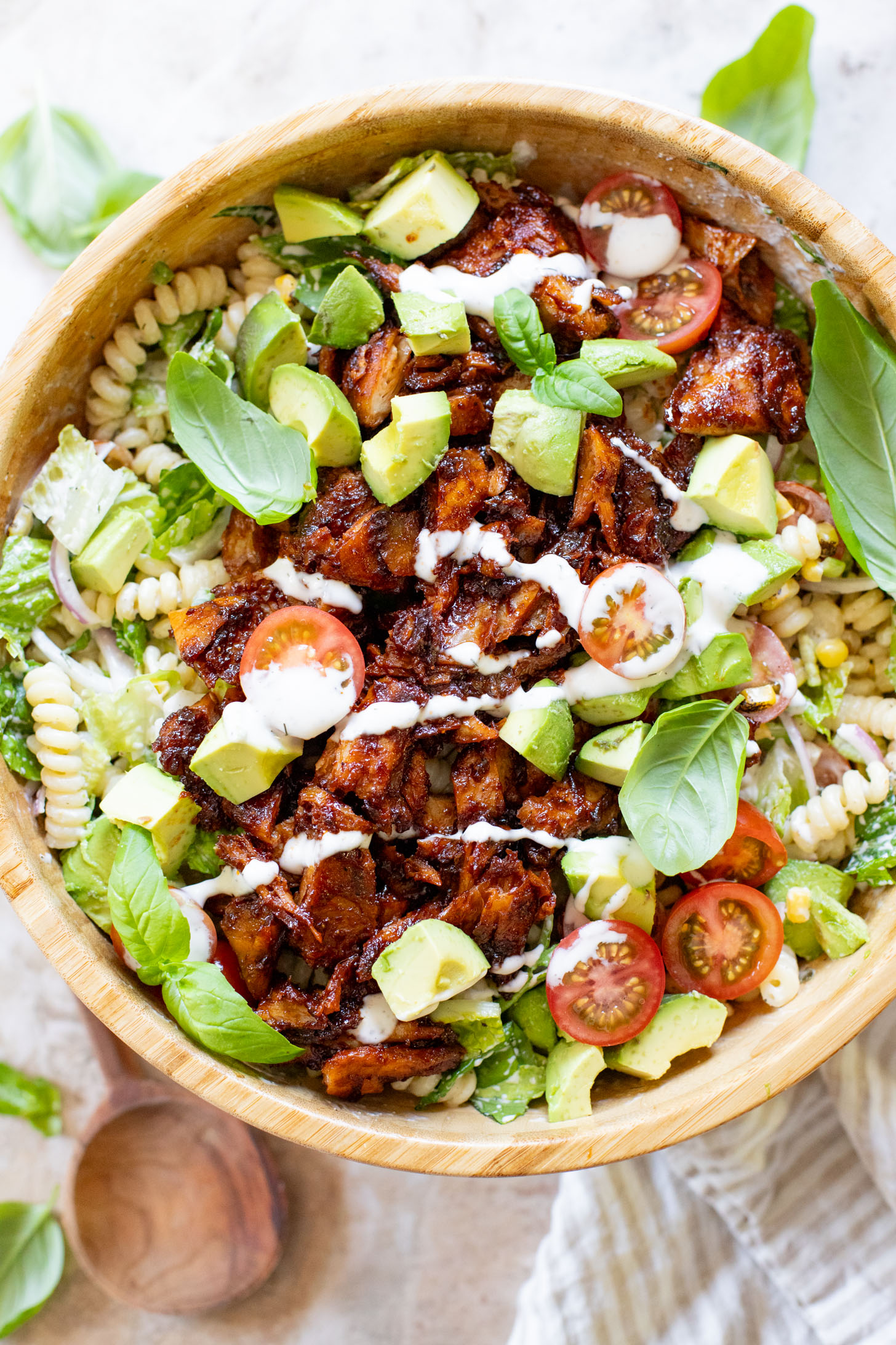 This Vegan BBQ Chicken Pasta Salad is a summer must make! Crisp veggies, charred vegan chicken and the best dairy-free creamy dressing | ThisSavoryVegan.com