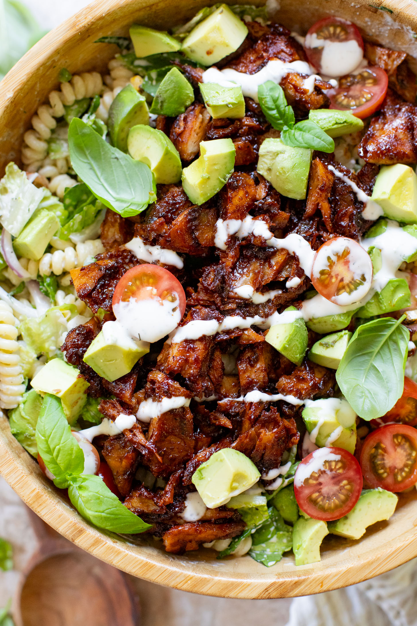This Vegan BBQ Chicken Pasta Salad is a summer must make! Crisp veggies, charred vegan chicken and the best dairy-free creamy dressing | ThisSavoryVegan.com