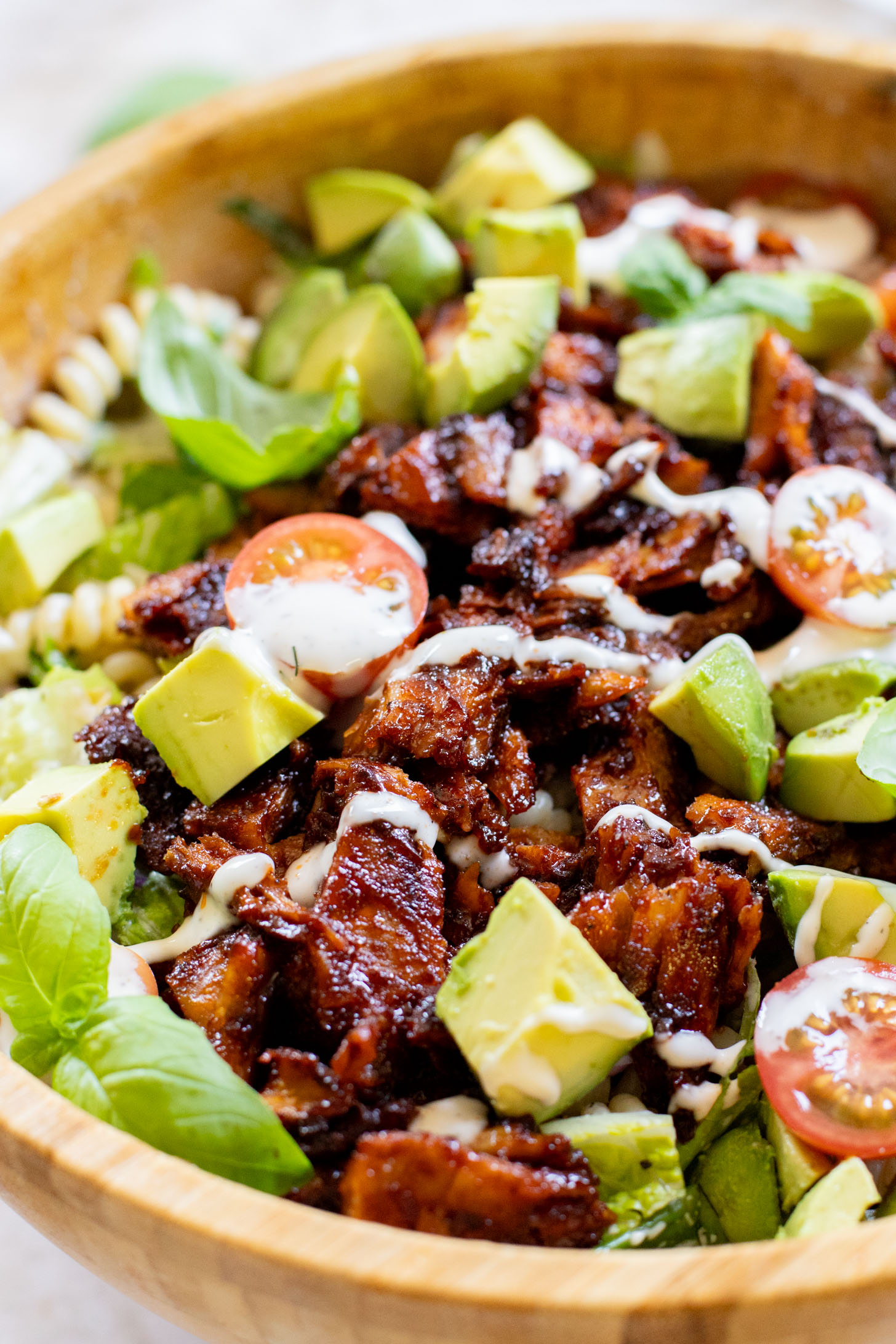 This Vegan BBQ Chicken Pasta Salad is a summer must make! Crisp veggies, charred vegan chicken and the best dairy-free creamy dressing | ThisSavoryVegan.com