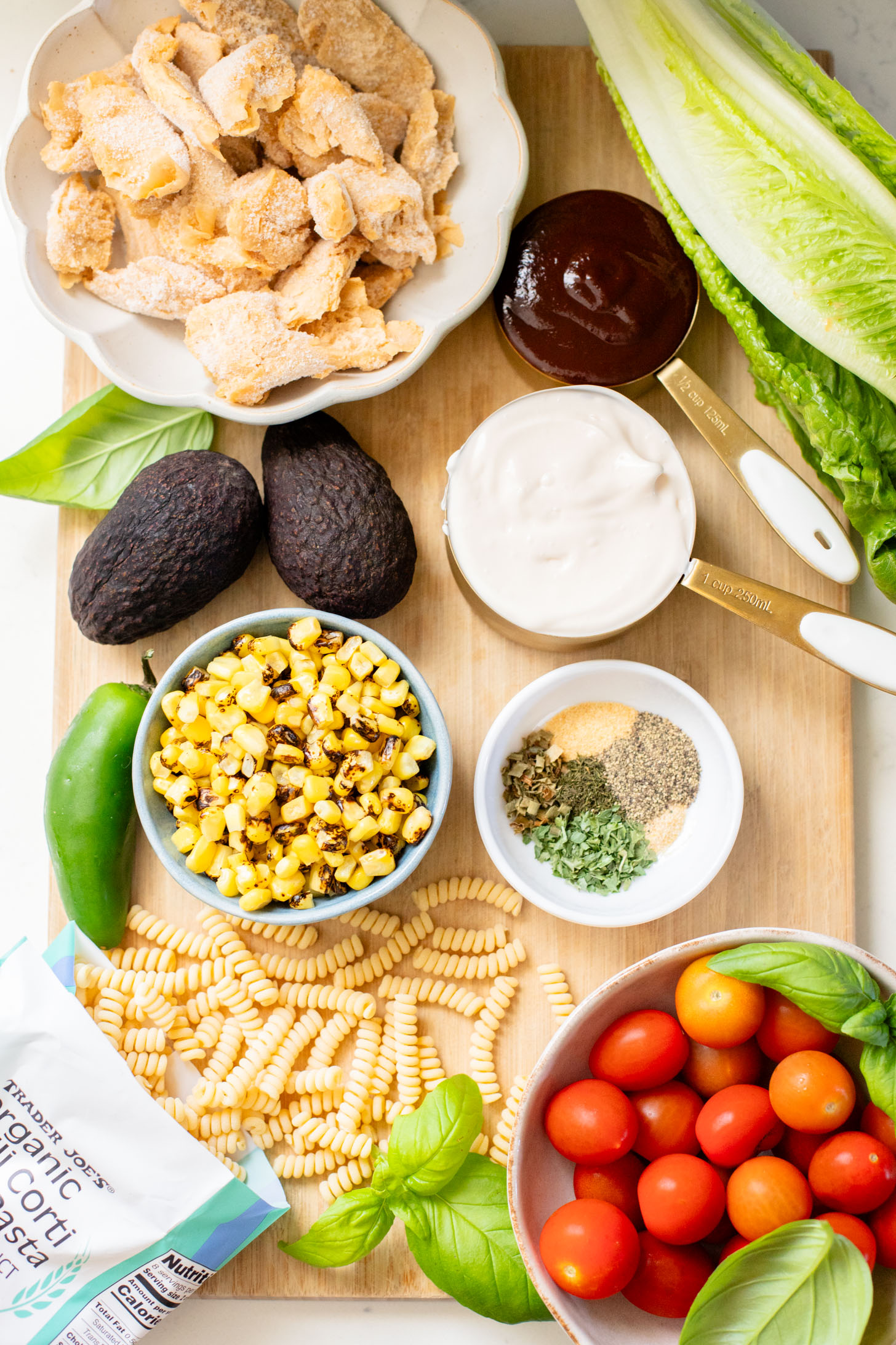 This Vegan BBQ Chicken Pasta Salad is a summer must make! Crisp veggies, charred vegan chicken and the best dairy-free creamy dressing | ThisSavoryVegan.com