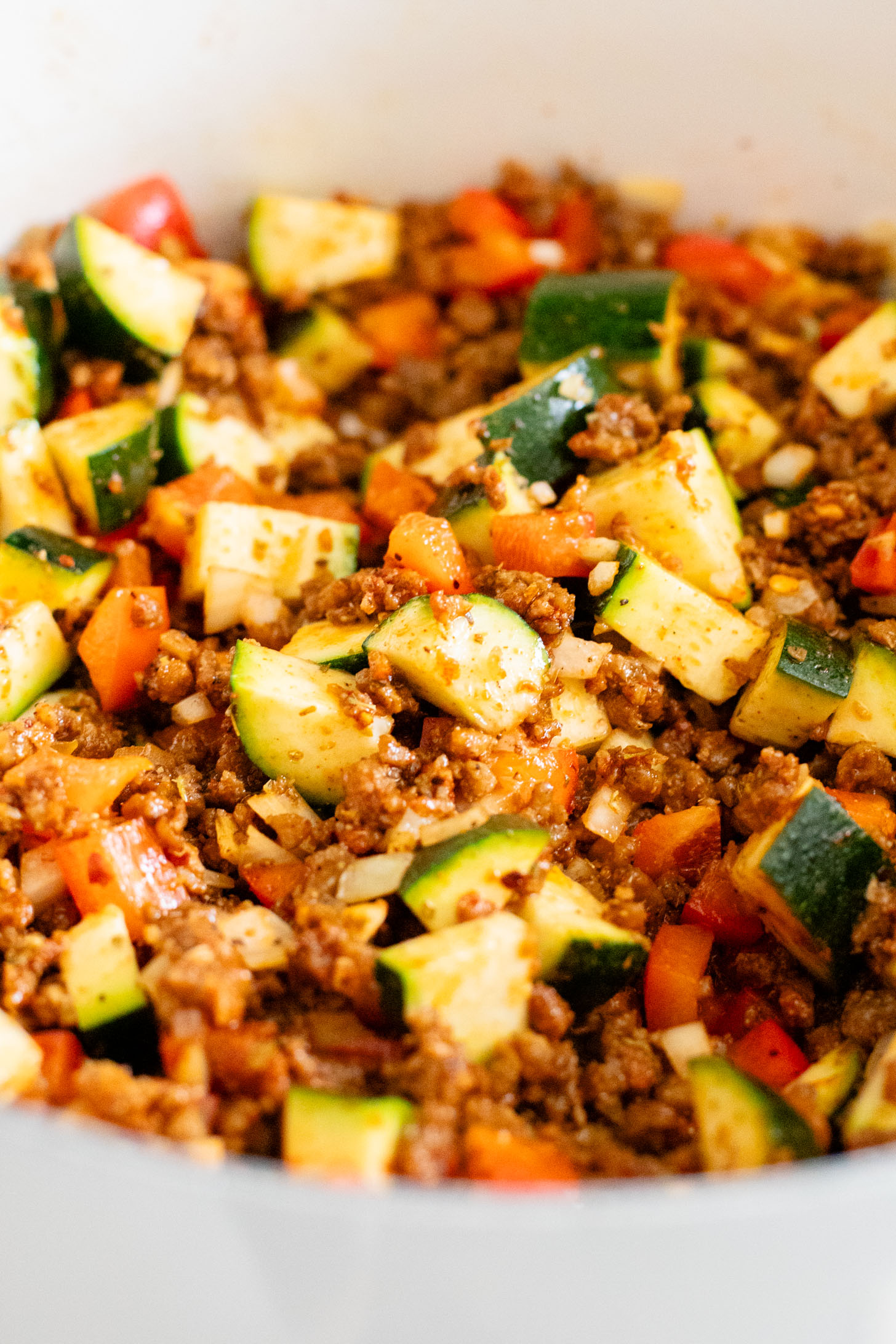 This Vegan Beef Zucchini Casserole is a hearty & delicious dinner idea. You get rice, veggies & plant protein in one tasty dish | ThisSavoryVegan.com