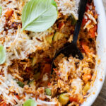 This Vegan Beef Zucchini Casserole is a hearty & delicious dinner idea. You get rice, veggies & plant protein in one tasty dish | ThisSavoryVegan.com