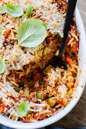 This Vegan Beef Zucchini Casserole is a hearty & delicious dinner idea. You get rice, veggies & plant protein in one tasty dish | ThisSavoryVegan.com