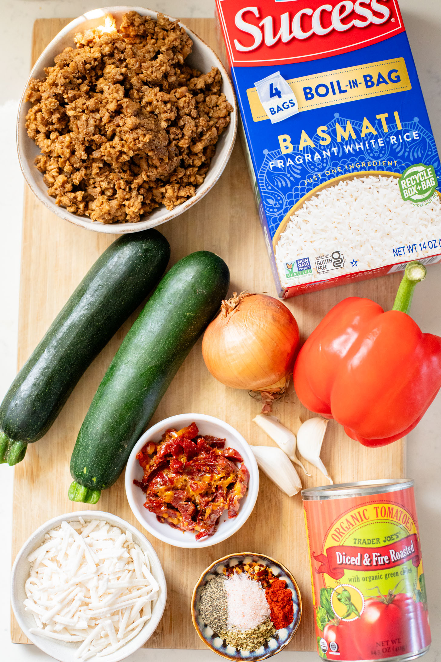 This Vegan Beef Zucchini Casserole is a hearty & delicious dinner idea. You get rice, veggies & plant protein in one tasty dish | ThisSavoryVegan.com