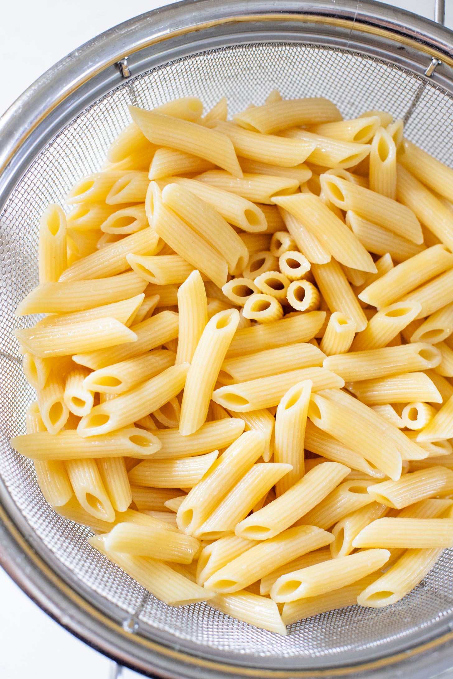 This 5-Ingredient Tomato Basil Penne is a quick, one-pot dinner! The cherry tomatoes & dairy-free cream make the best pasta sauce | ThisSavoryVegan.com