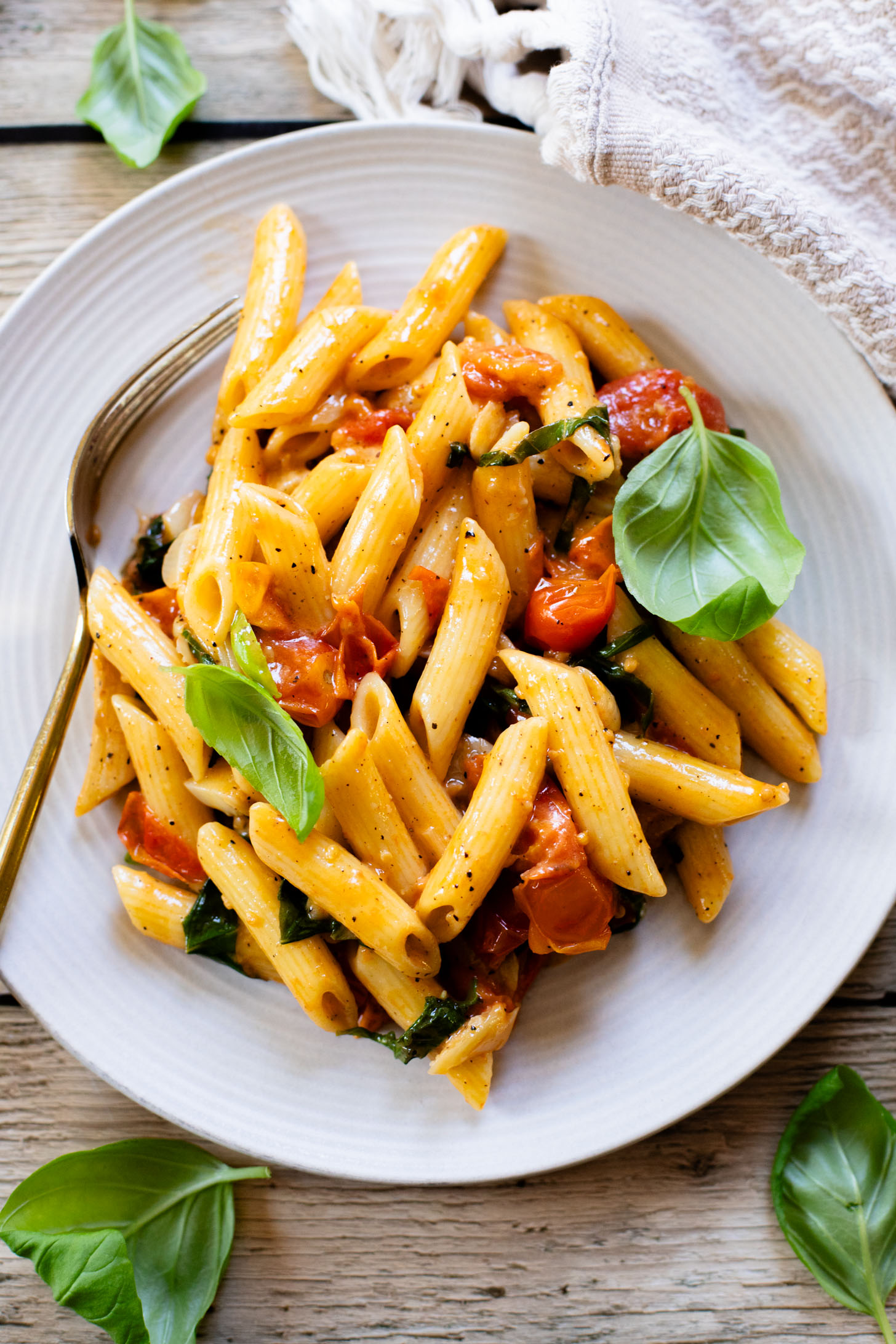 This 5-Ingredient Tomato Basil Penne is a quick, one-pot dinner! The cherry tomatoes & dairy-free cream make the best pasta sauce | ThisSavoryVegan.com