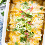 These Black Bean & Zucchini Enchiladas are the perfect way to use up summer zucchini. These enchiladas are dairy-free and delicious | ThisSavoryVegan.com