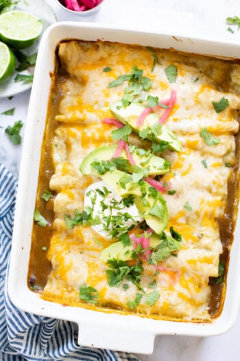 These Black Bean & Zucchini Enchiladas are the perfect way to use up summer zucchini. These enchiladas are dairy-free and delicious | ThisSavoryVegan.com