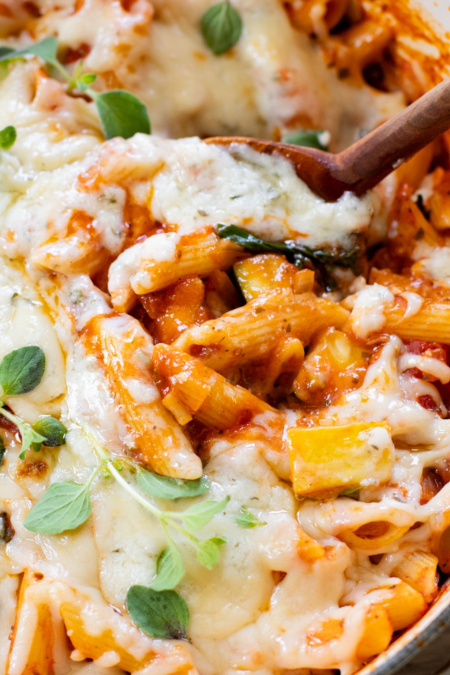 This Cheesy Zucchini Penne is a one-pot, dairy-free dinner! Packed with summer squash, marinara and a cheesy topping | ThisSavoryVegan.com