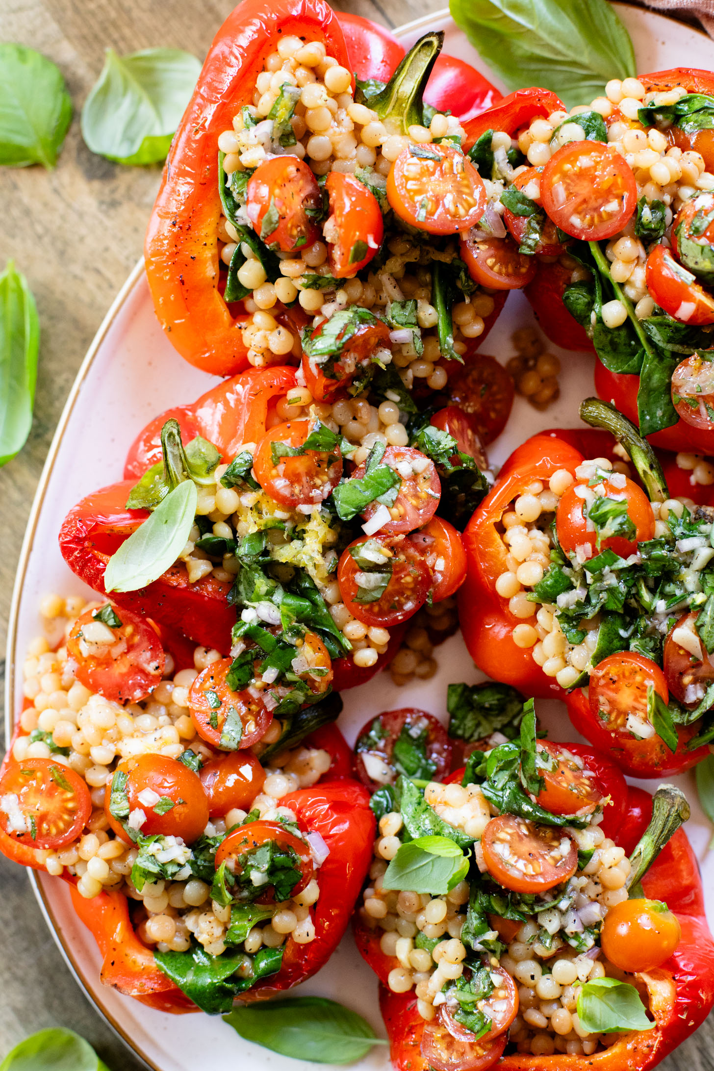 You could also throw the bell peppers on the grill for a couple minutes per side! If vegan cheese isn't your thing, just omit the feta. To add in some extra protein, throw in 1/2 cup of chickpeas with the couscous | ThisSavoryVegan.com