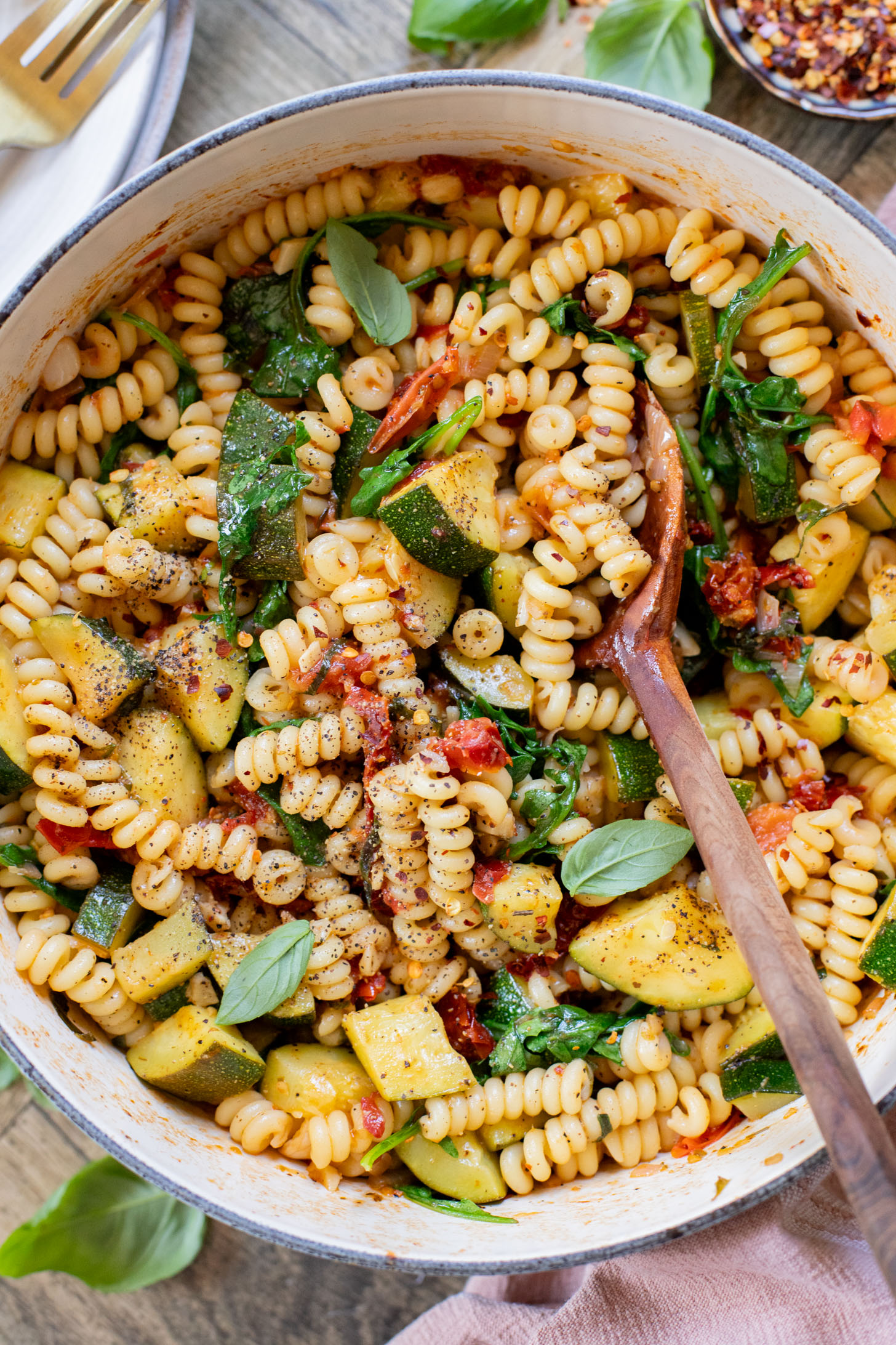 This One-Pot Summer Veggie Pasta is ready in 30 minutes and is filled with zucchini, tomatoes, greens & basil. Simple & delicious vegan pasta | ThisSavoryVegan.com